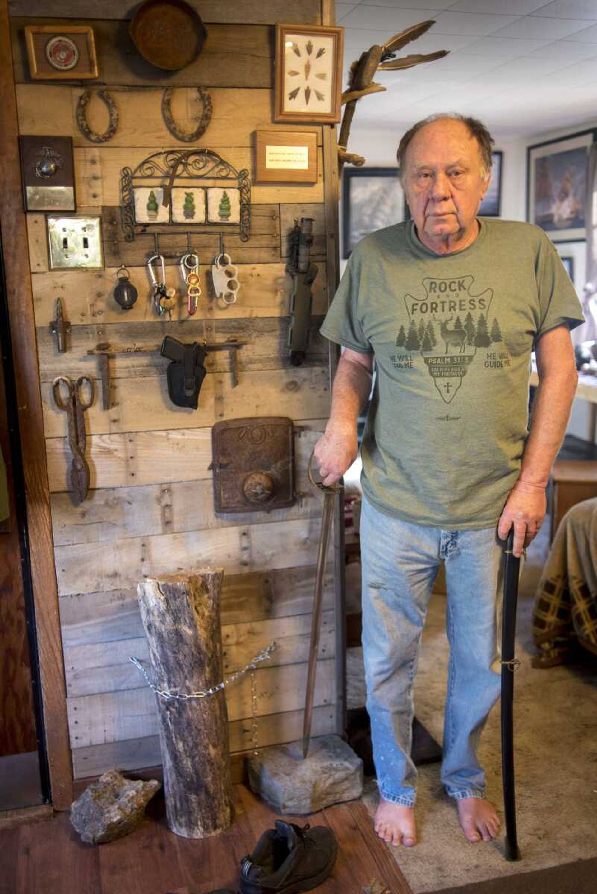 Cutline-Body Copy:Emmett "Butch" Bounds' poses with his cavalry sword Thursday, Nov. 16, in Cape Girardeau.