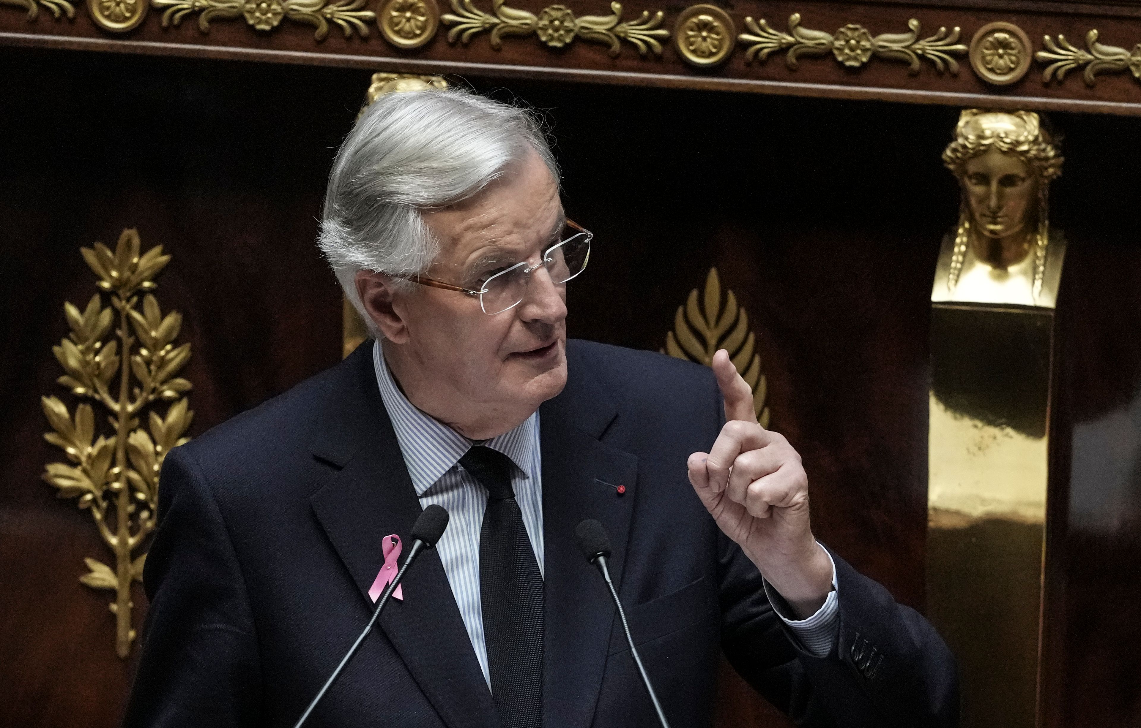 France's Prime Minister Michel Barnier delivers a speech at the National Assembly, in Paris, Tuesday, Oct. 1, 2024. (AP Photo/Thibault Camus)