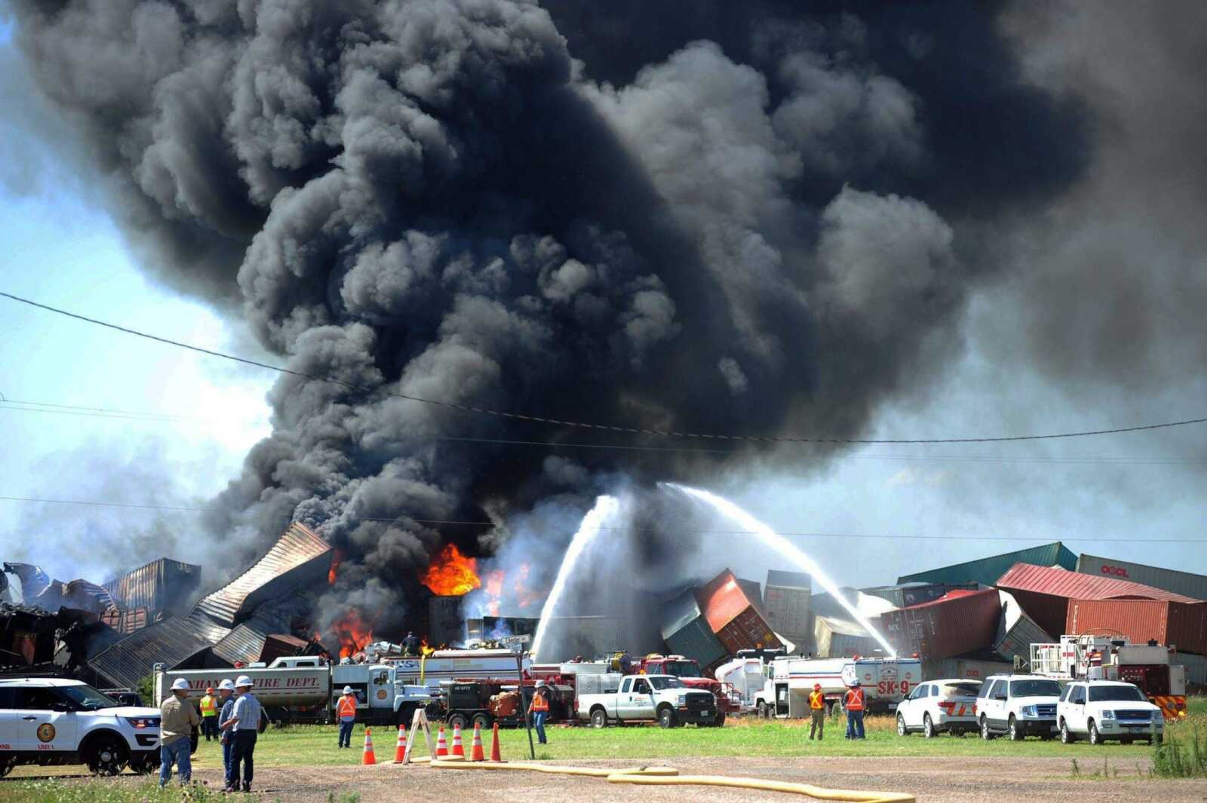 Three crew members were missing, and one was hurt Tuesday after a head-on train collision in Panhandle, Texas, that caused several box cars to erupt in flames and led authorities to evacuate residents in the area.