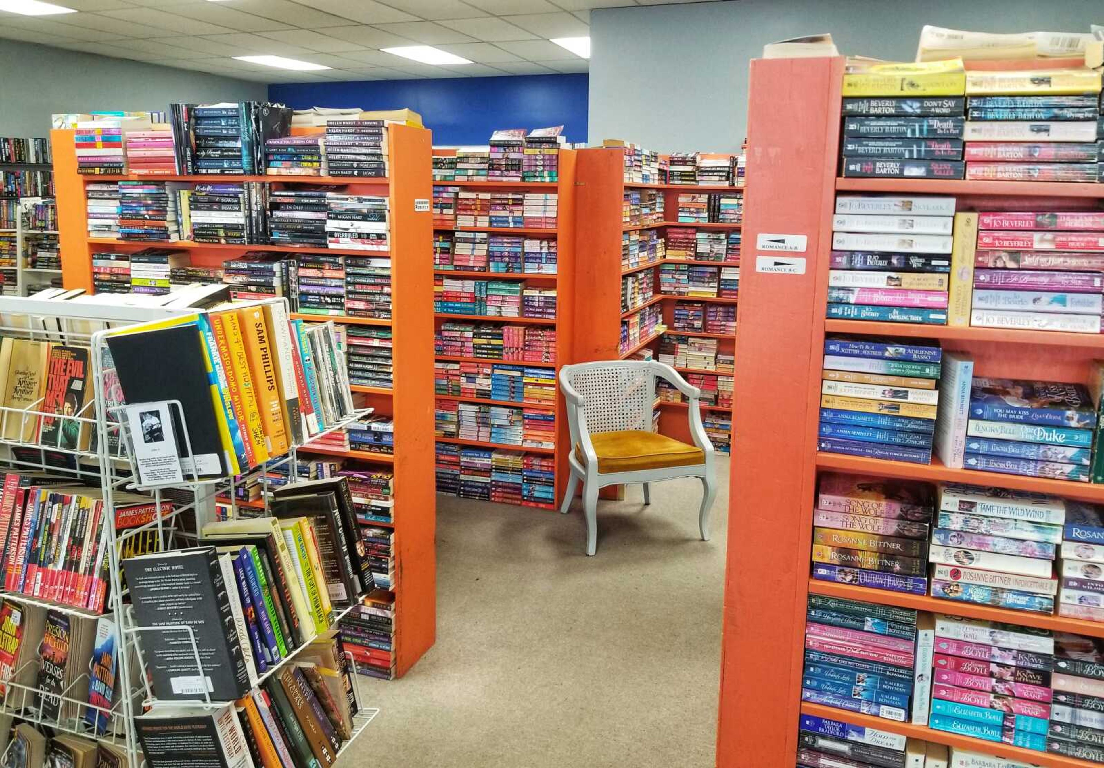 Orange book shelves, made by Book Rack owner John Hendricks' late father, Jack, were trendy in the late 1970s. In those days, a book shelf painted orange was thought to contrast well with the books placed on them and were considered visually appealing to a potential buyer.