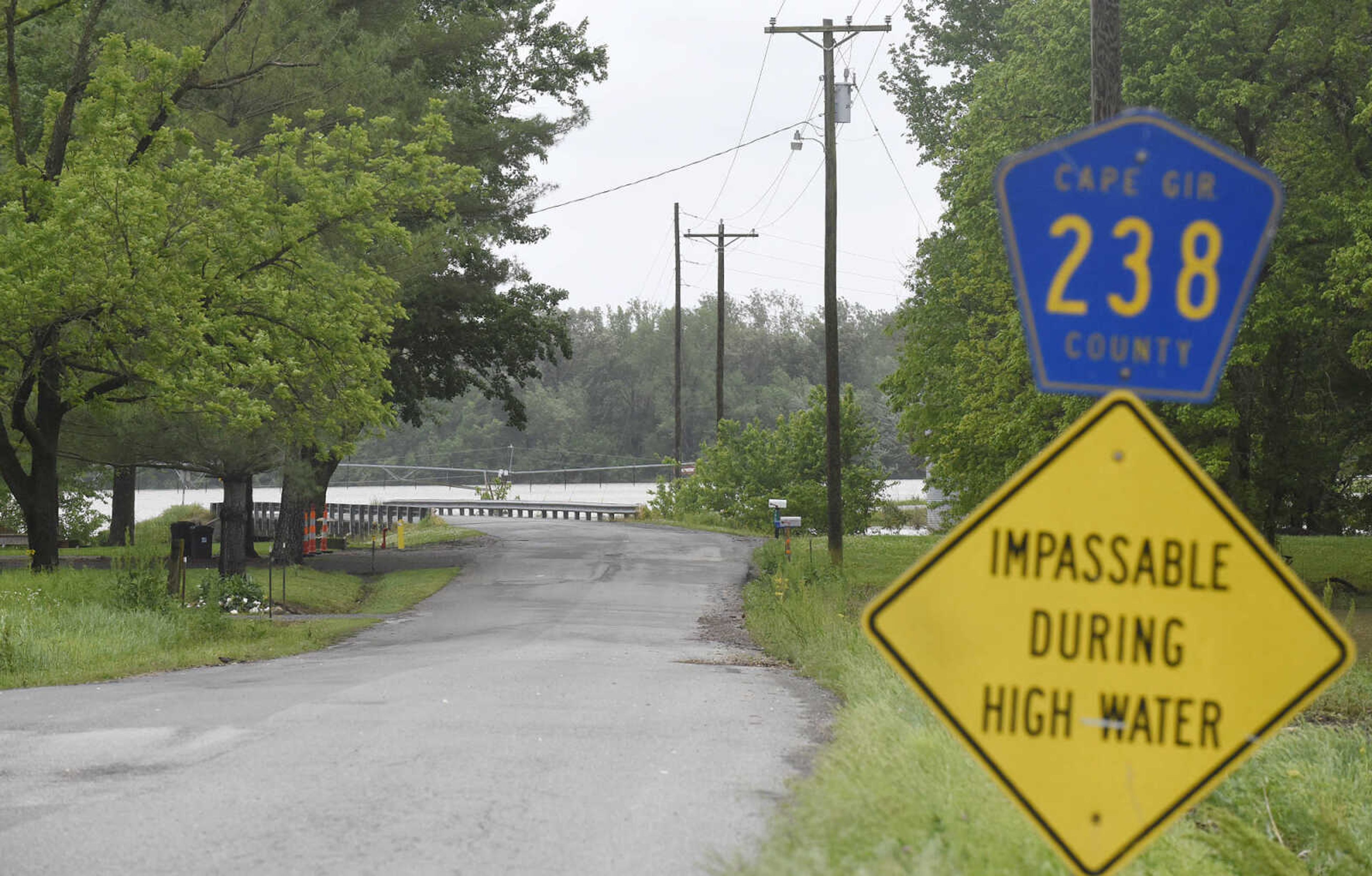 Floodwater creeps closer to homes along Cape Girardeau County Road 238 on Thursday, May 4, 2017, in Allenville, Missouri.