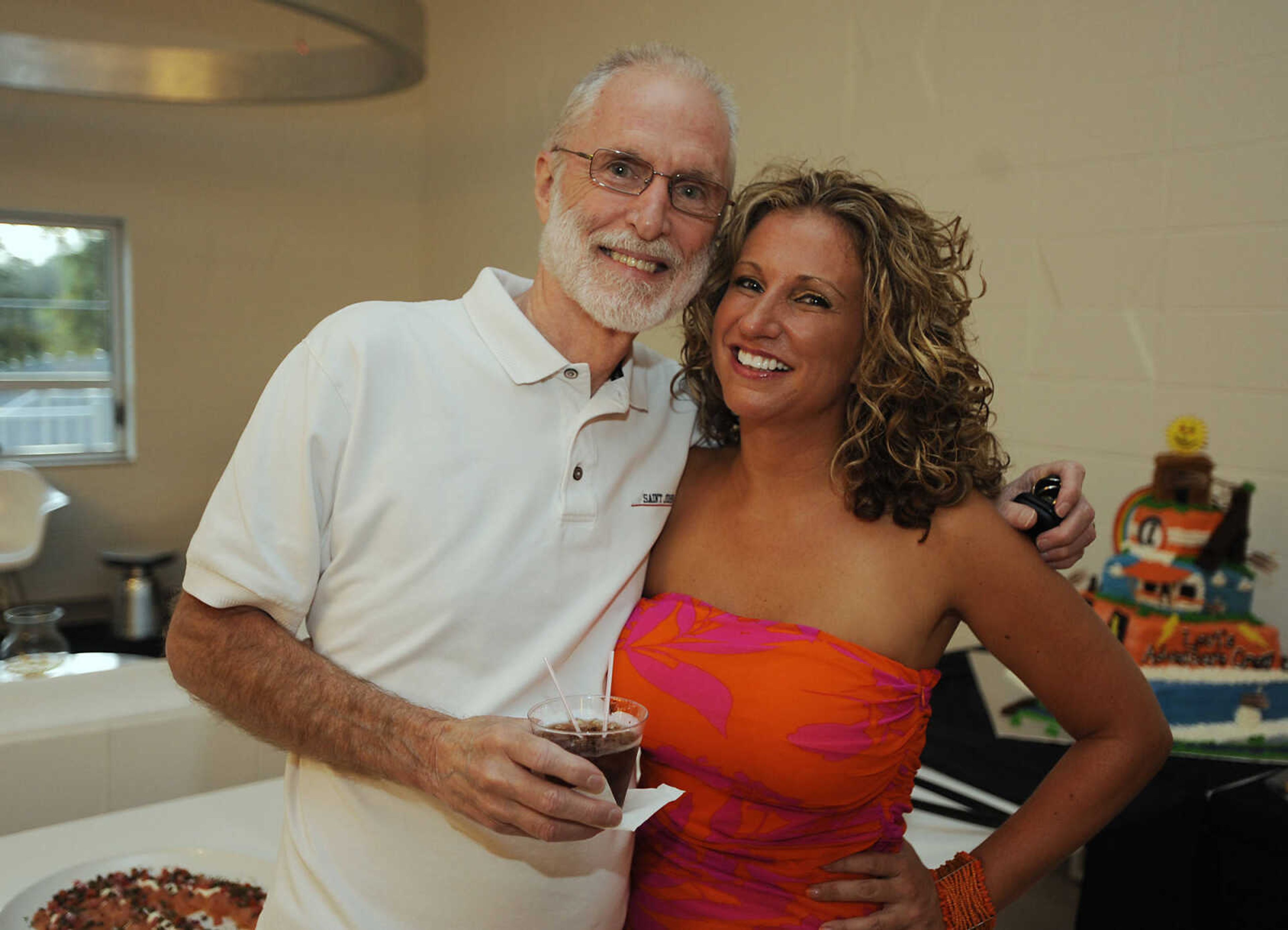 Steve Mosley and Gina Crabtree at The Summer Cocktail Soiree Friday, Aug. 3, at the Concourse, 429 N. Broadview St. in Cape Girardeau. A fundraiser for Levi's Adventure Trail, an exhibit at the Discovery Playhouse in Cape Girardeau, the event featured live music, a silent auction and gourmet appetizers. The exhibit is named after Levi Stephen Collom, who died at age 3 earlier this year. Mosley is Levi's grandfather.