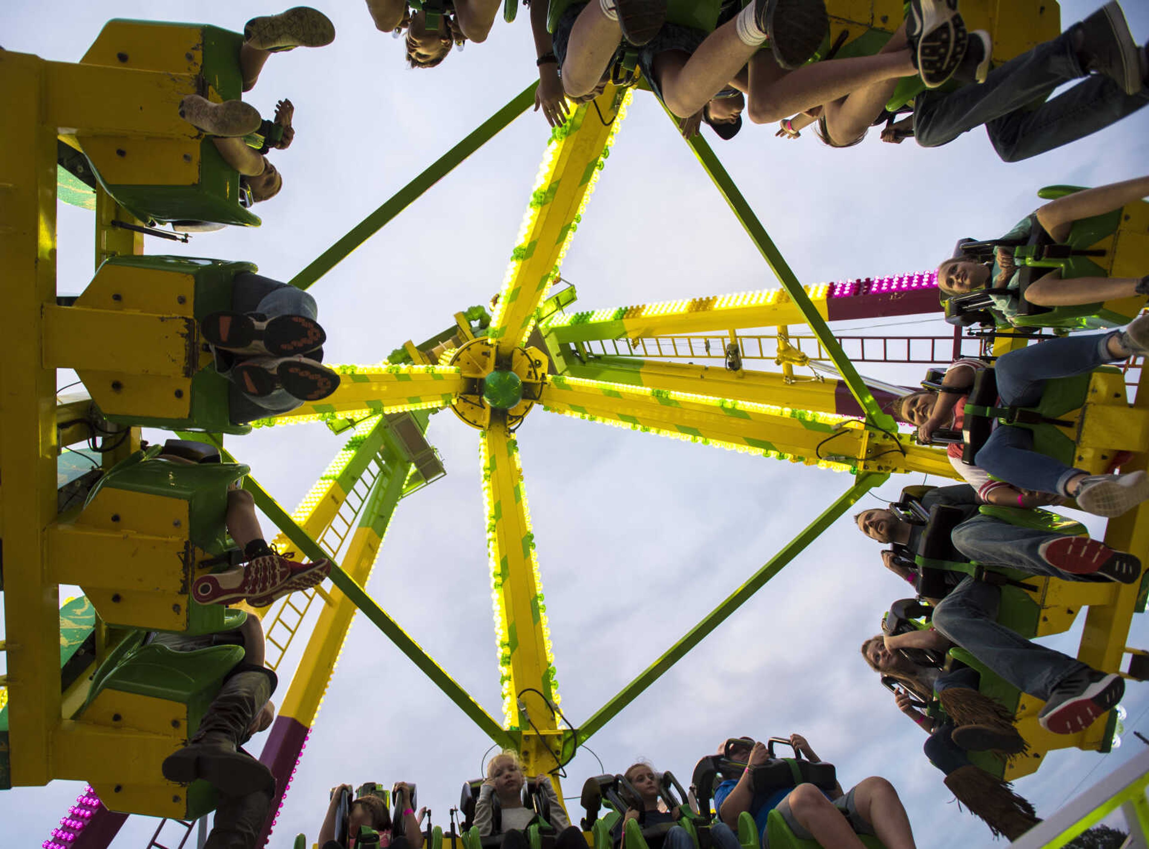 People ride amusement rides during the SEMO District Fair Wednesday, Sept. 13, 2017 at Arena Park in Cape Girardeau.