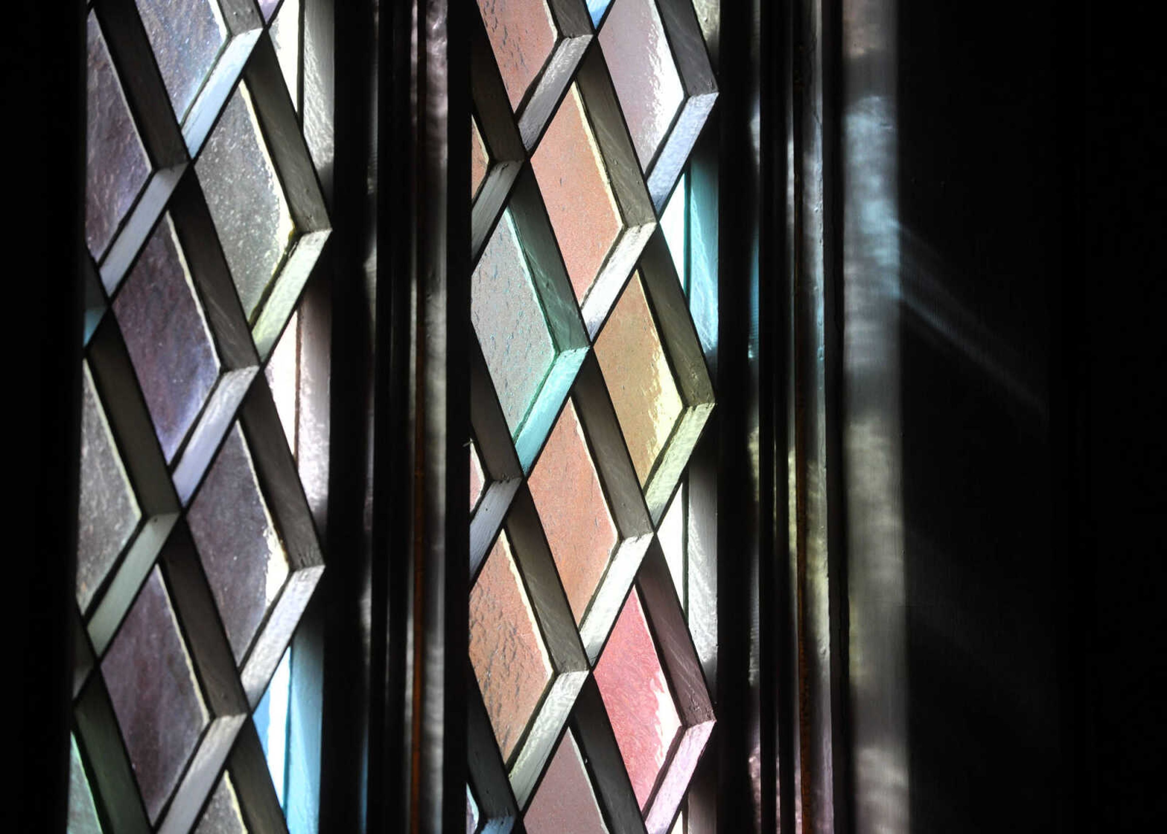 LAURA SIMON ~ lsimon@semissourian.com

Lights shines through the stained glass windows of Old St. Vincent's Catholic Church, Monday, March 30, 2015, in downtown Cape Girardeau.