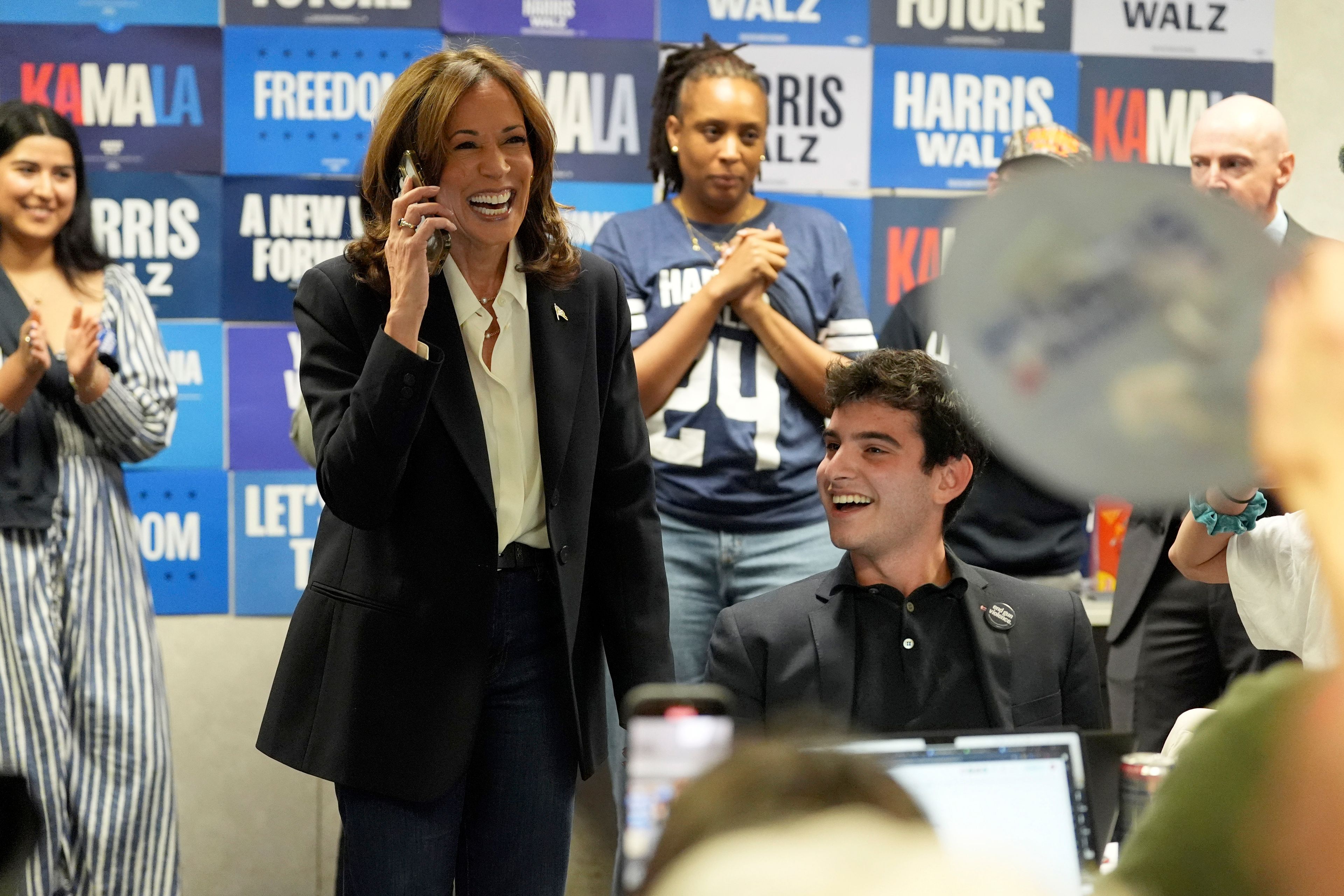 Democratic presidential nominee Vice President Kamala Harris phone banks with volunteers at the DNC headquarters on Election Day, Tuesday, Nov. 5, 2024, in Washington. (AP Photo/Jacquelyn Martin)