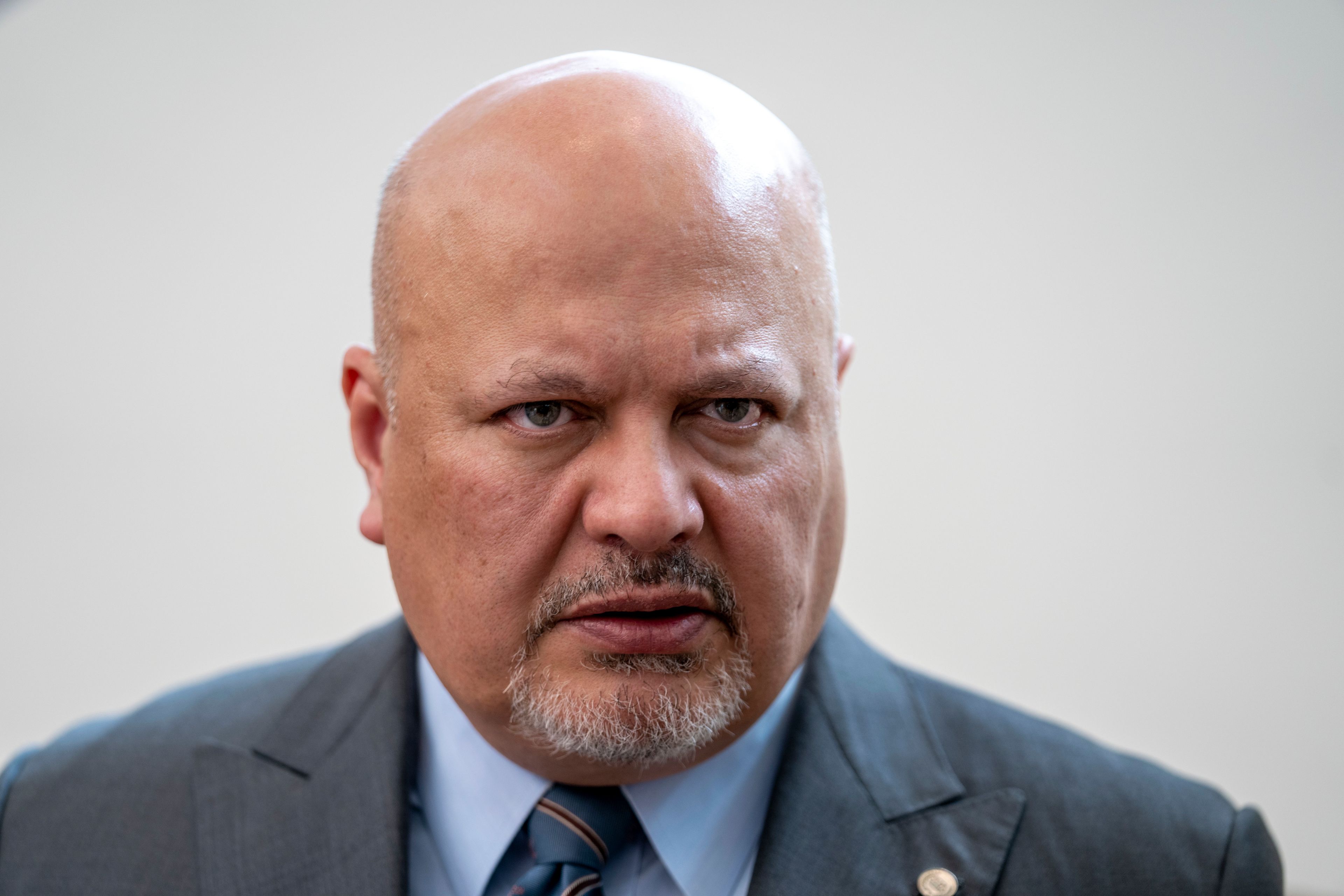 FILE - Karim Khan, Prosecutor of the International Criminal Court looks up prior to a press conference in The Hague, Netherlands, Monday, July 3, 2023. (AP Photo/Peter Dejong, File)