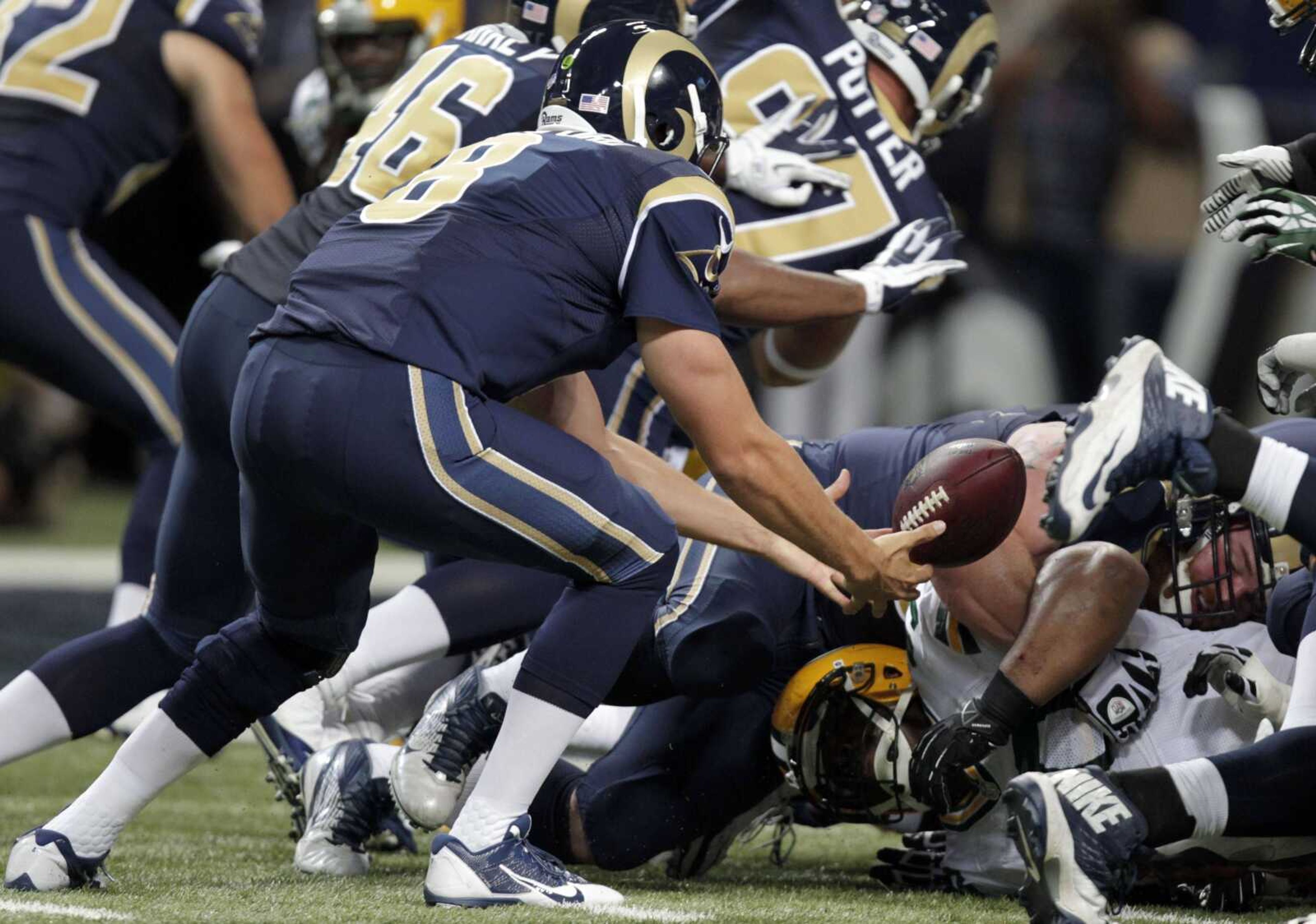 Rams quarterback Sam Bradford fumbles on the 2-yard line during the first quarter of Saturday&#8217;s 19-7 exhibition loss to the Green Bay Packers. (Tom Gannam ~ Associated Press)