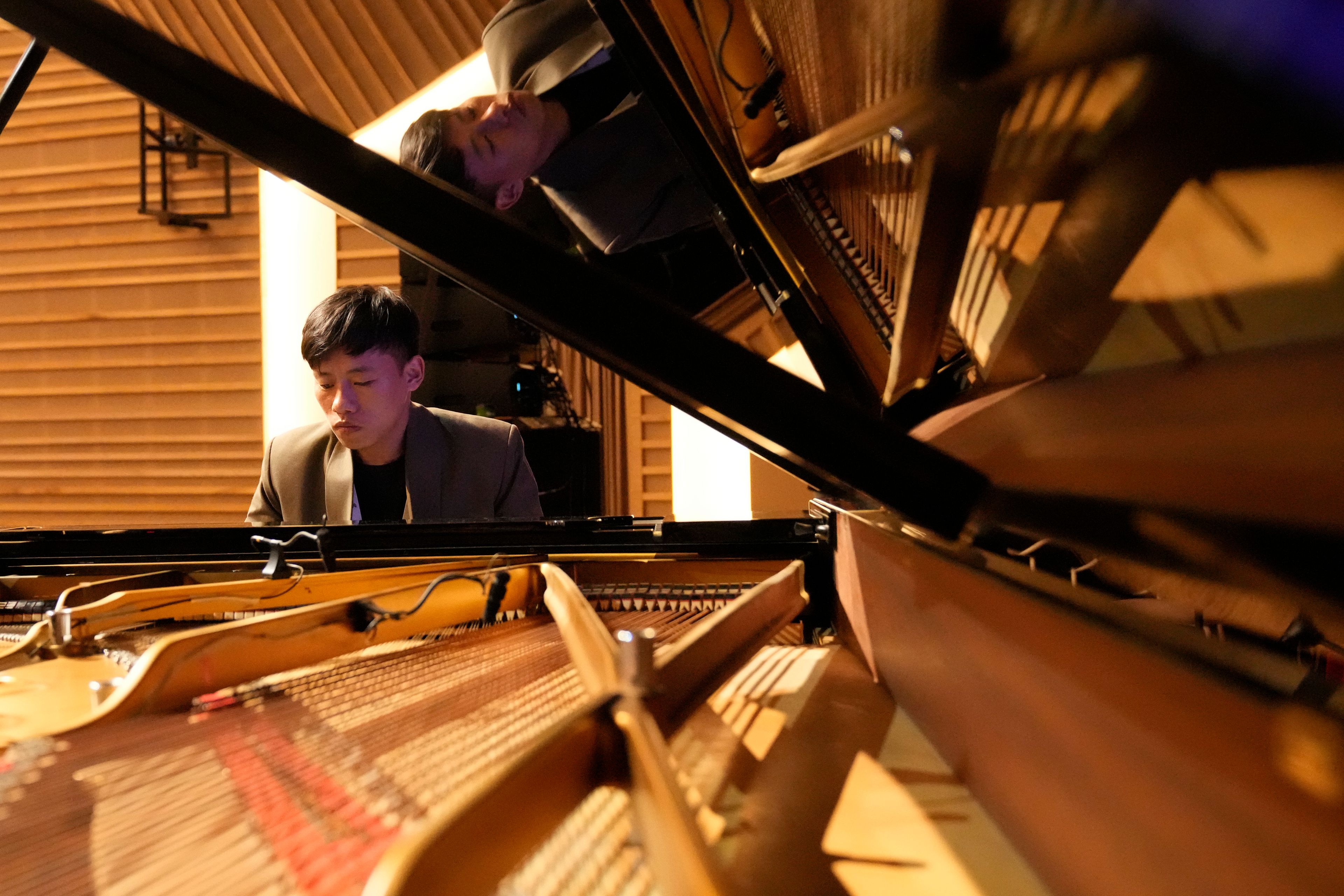 Takosangba Jamir, 27, a blind pianist, rehearses during the two-day Brillante Piano Festival in Bengaluru, India, Sunday, Sept. 29, 2024. (AP Photo/Aijaz Rahi)