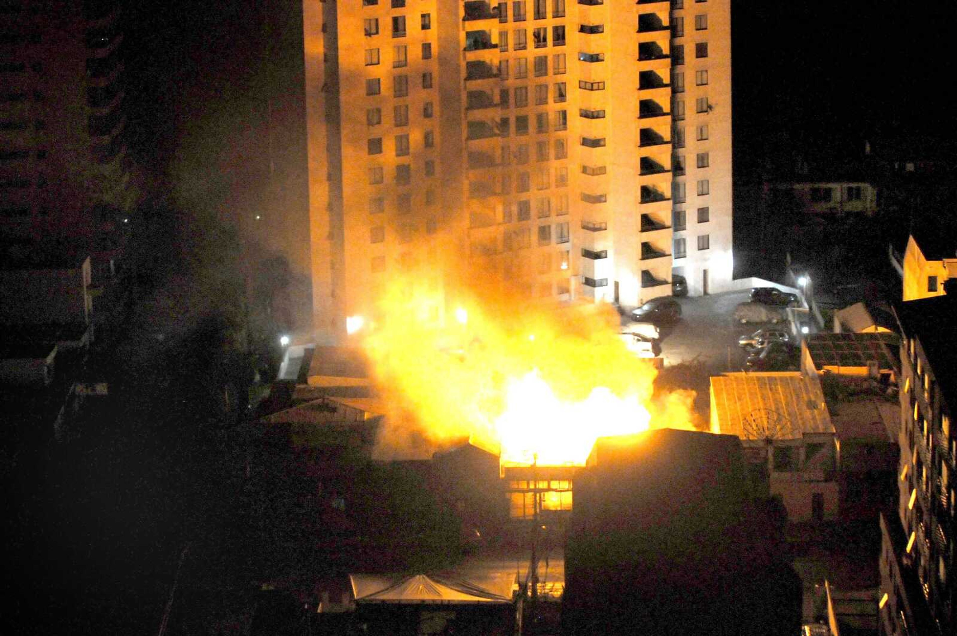 A fire burns at a restaurant Tuesday after an earthquake in Iquique, Chile. A magnitude-8.2 earthquake struck off Chile&#8217;s northern coast Tuesday night. (Christian Viveros ~ Associated Press)