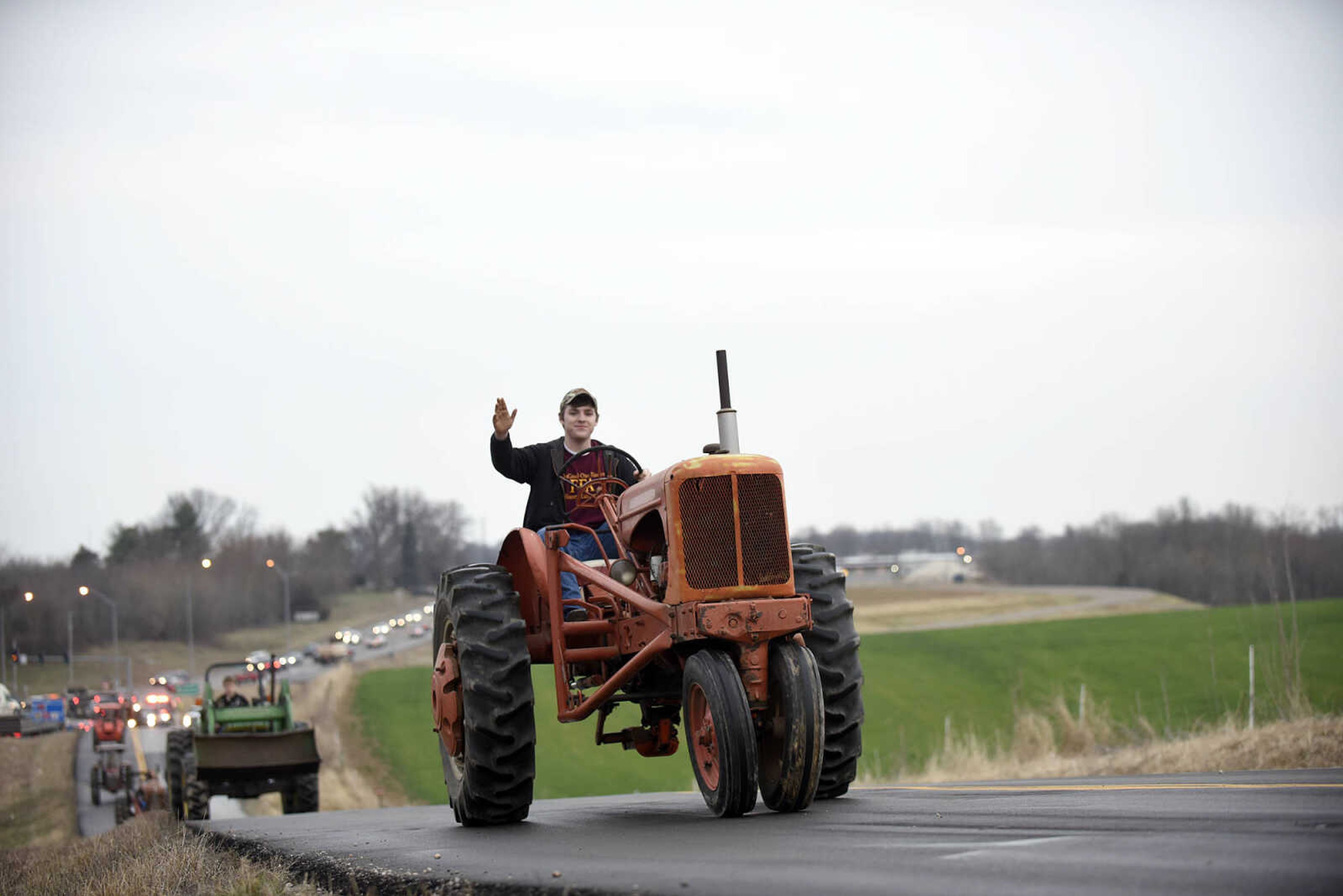 Saxony Lutheran High School FFA students take to the road on their tractors during drive your tractor to school day on Tuesday morning, Feb. 21, 2017. Students began their journey to school from Davis Farm Supply on Highway 61 in Jackson as part of FFA Week.