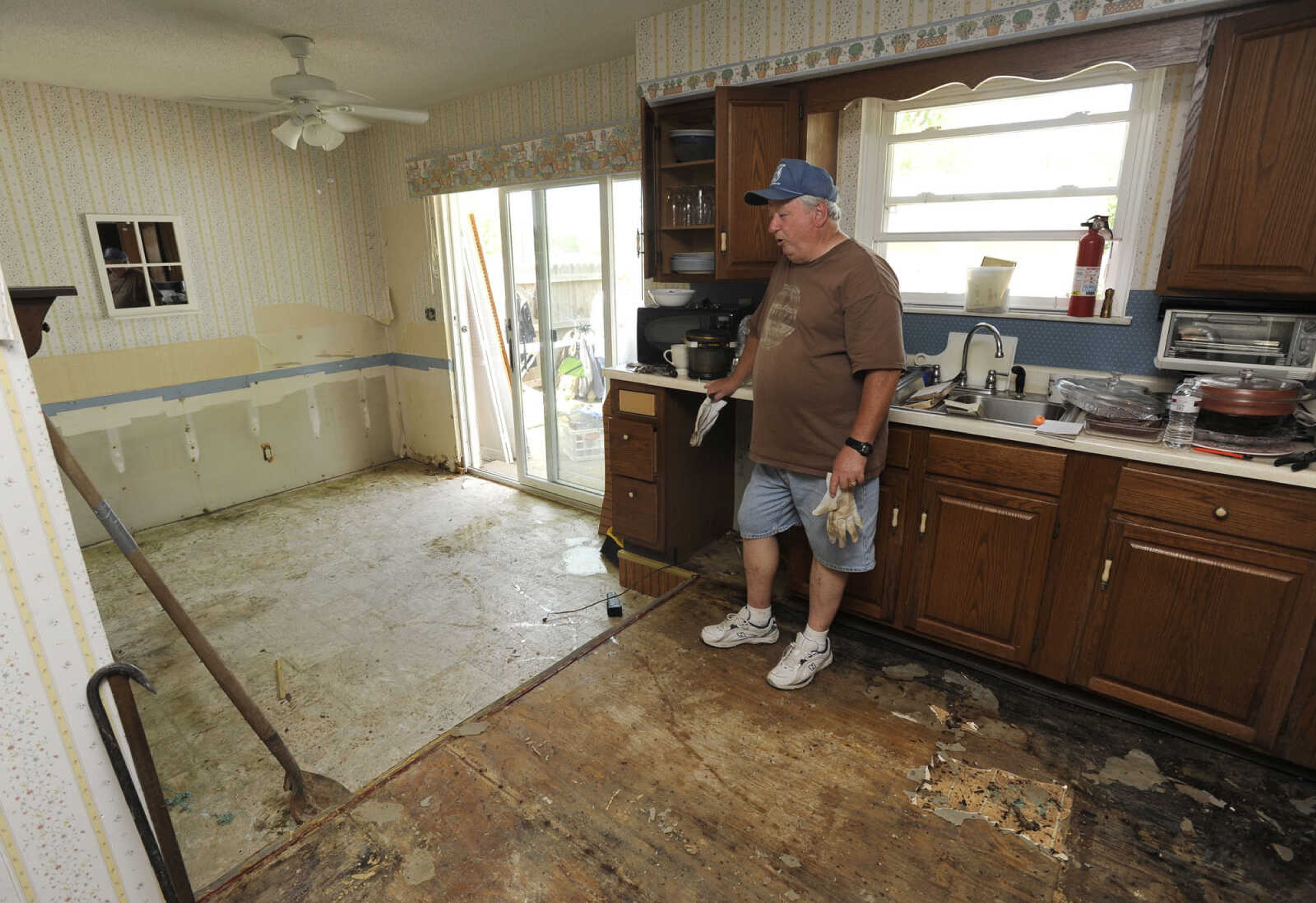 FRED LYNCH ~ flynch@semissourian.com
Jim Melton says Thursday, May 12, 2011 that floodwaters from Horseshoe Lake have never reached his house in the Mel Grah subdivision across from the lake in the 31 years he has lived there.