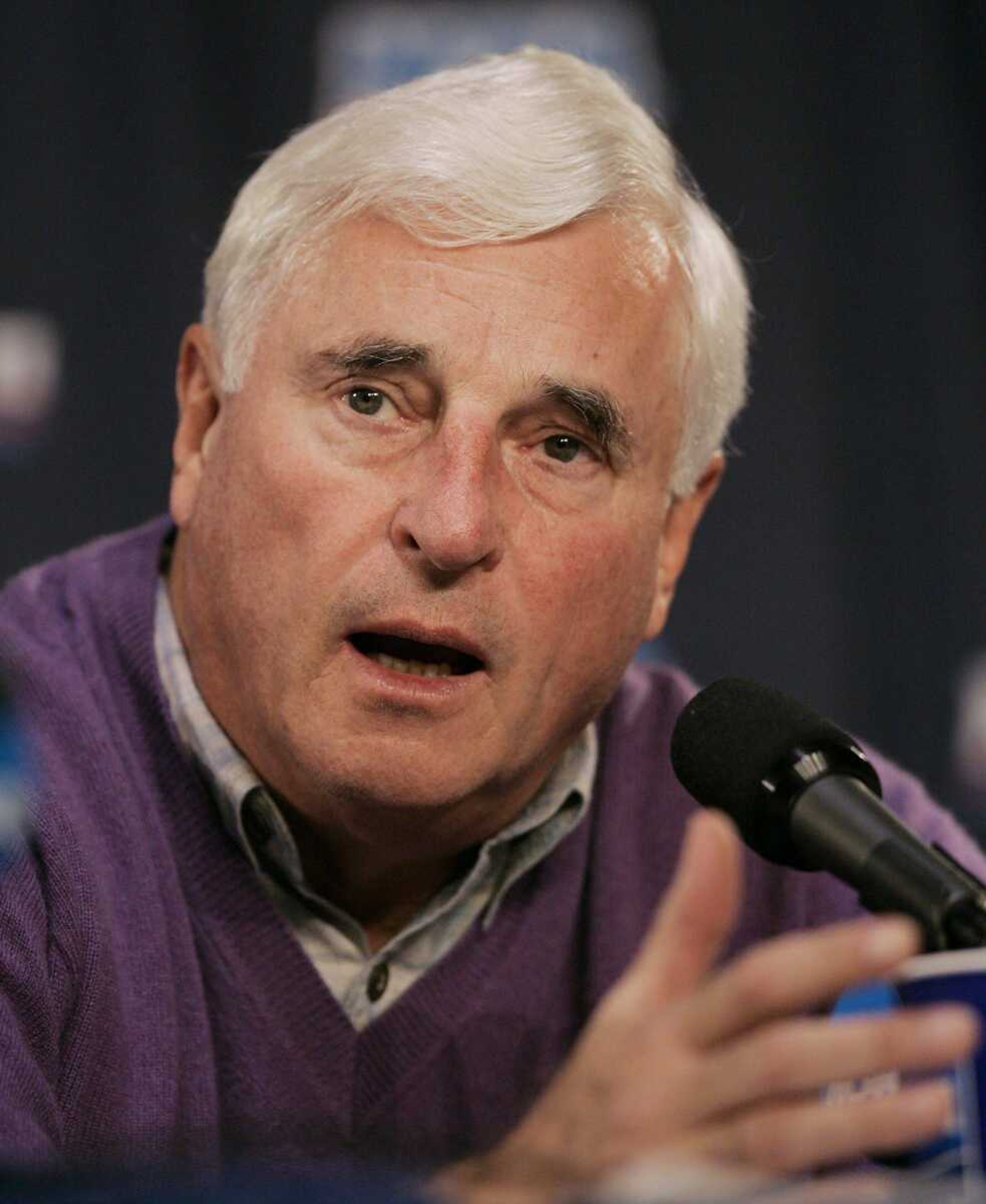 Texas Tech men's basketball head coach Bob Knight answers a question during a news conference in Albuquerque, N.M., Wednesday, March 23, 2005,  in this file photo. When the Hall of Fame coach Knight gets win No. 900 he'll join Jody Conradt and Pat Summitt as the only members of the Division I club. (AP Photo/Joe Cavaretta,file)