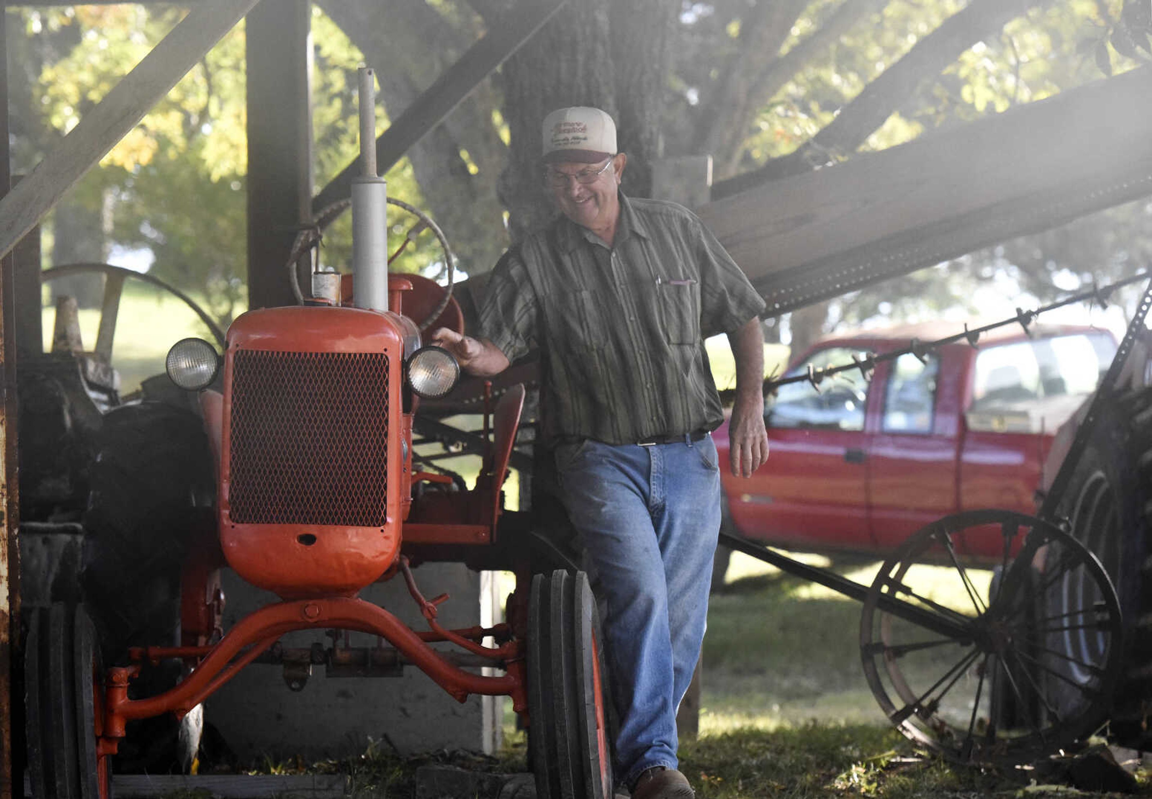 LAURA SIMON ~ lsimon@semissourian.com

Paul Meyer tinkers with the tractor that powers the sorghum press on Monday, oct. 10, 2016, in New Hamburg, Missouri.