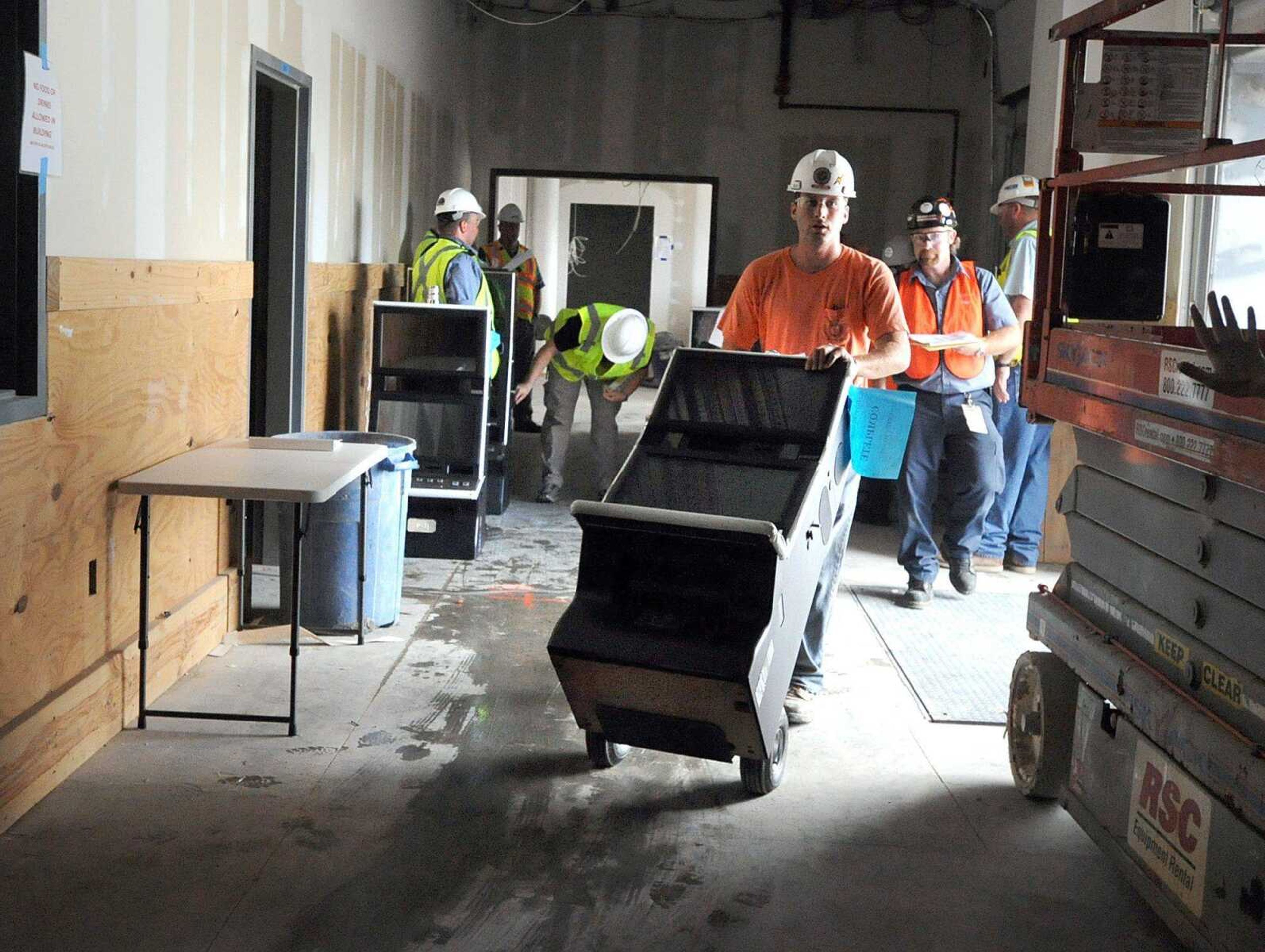 The first shipment of slot machines arrive to the Isle of Capri Monday, July 16, 2012 in Cape Girardeau. The shipment contained 100 of the 1000 total slot machines that will be inside the casino when it is complete. (Laura Simon)