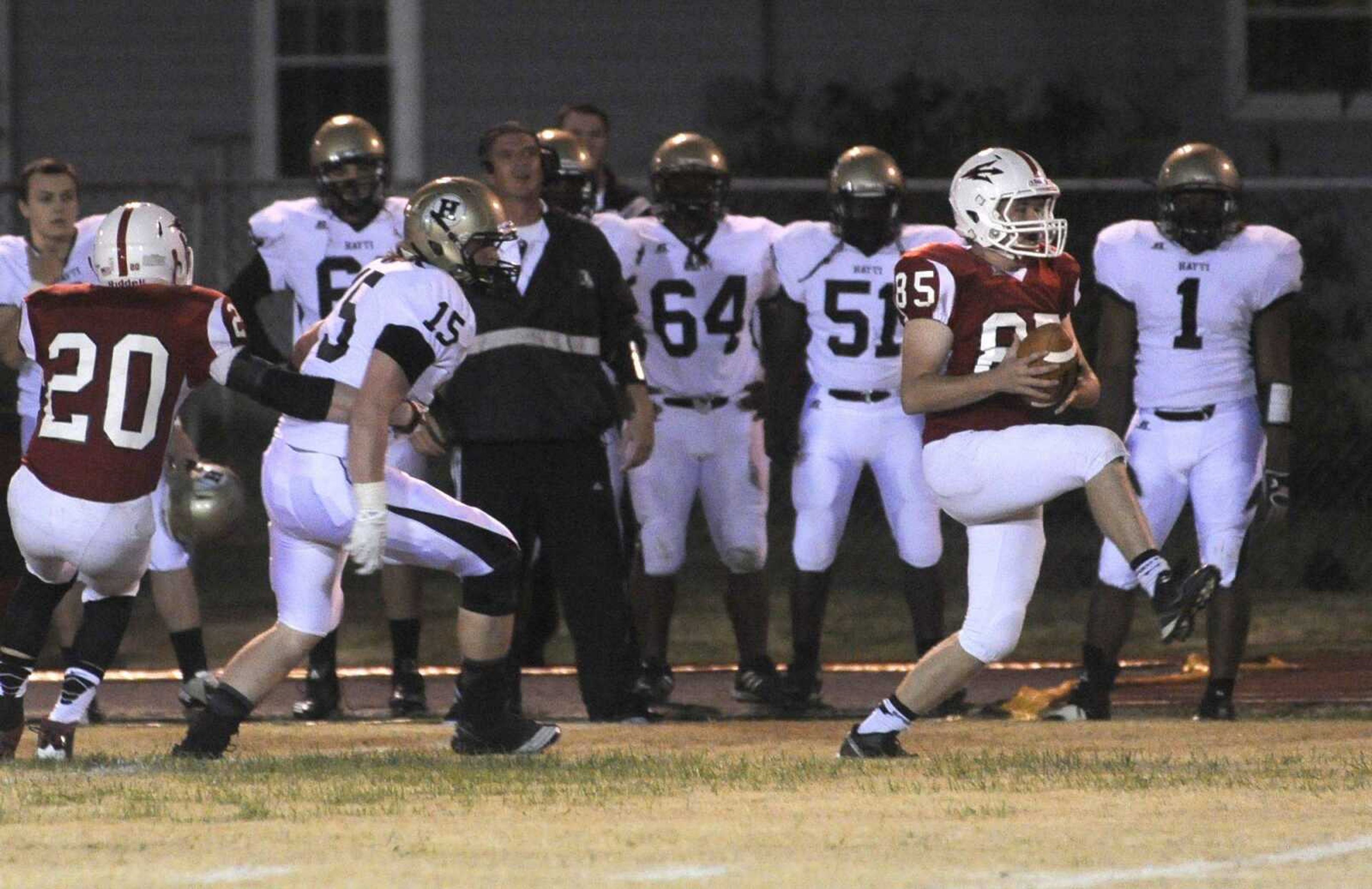 Chaffee&#8217;s Storm Estes intercepts a Hayti pass in front of Hayti&#8217;s Devan Riddick during the first quarter of the Class 1 District 1 first-round game Friday in Chaffee, Mo. Chaffee won 34-12. (Fred Lynch)