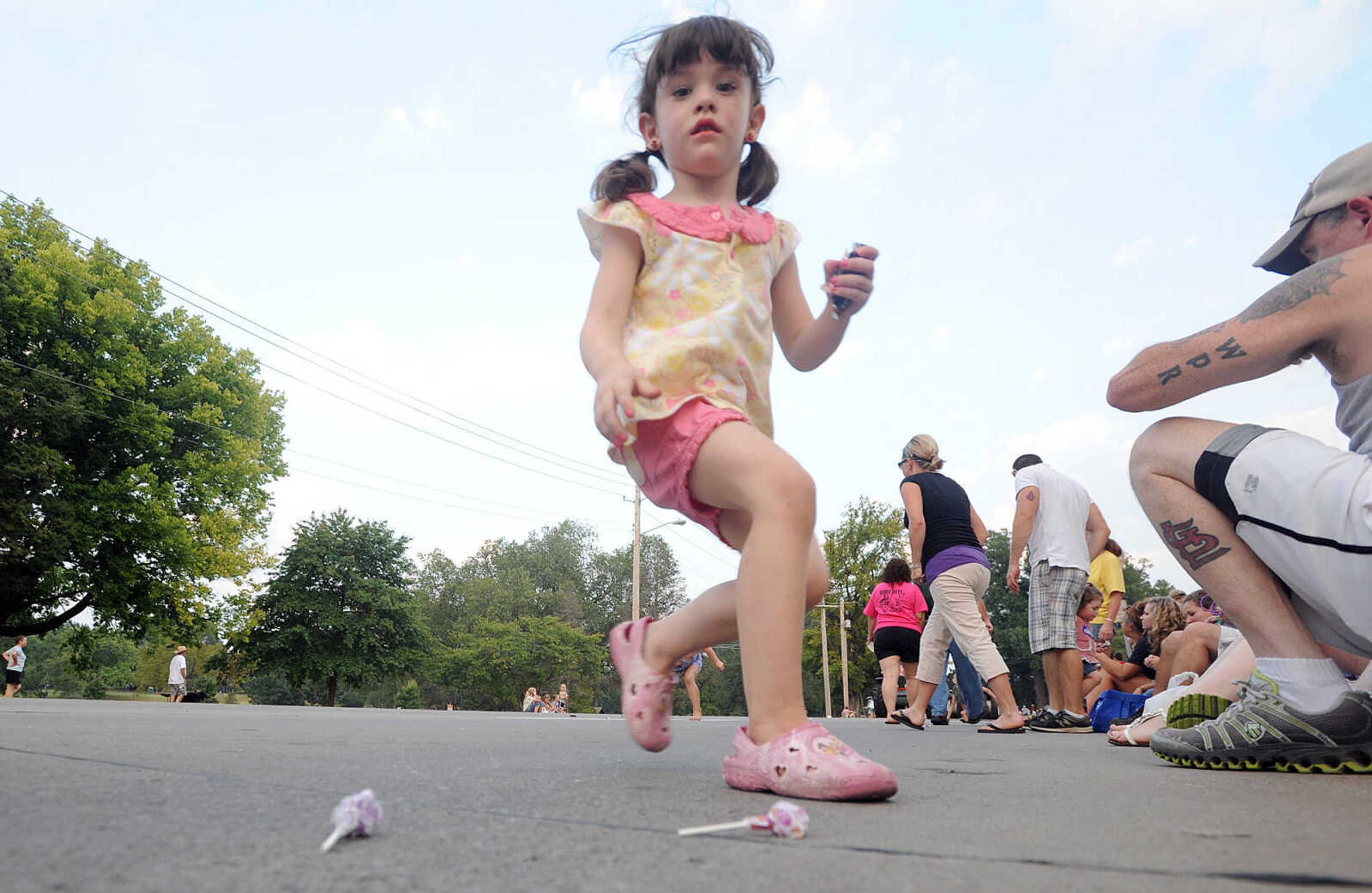 LAURA SIMON ~ lsimon@semissourian.com

The SEMO District Fair Parade moves along Broadway towards Arena Park, Monday, Sept. 9, 2013, in Cape Girardeau.