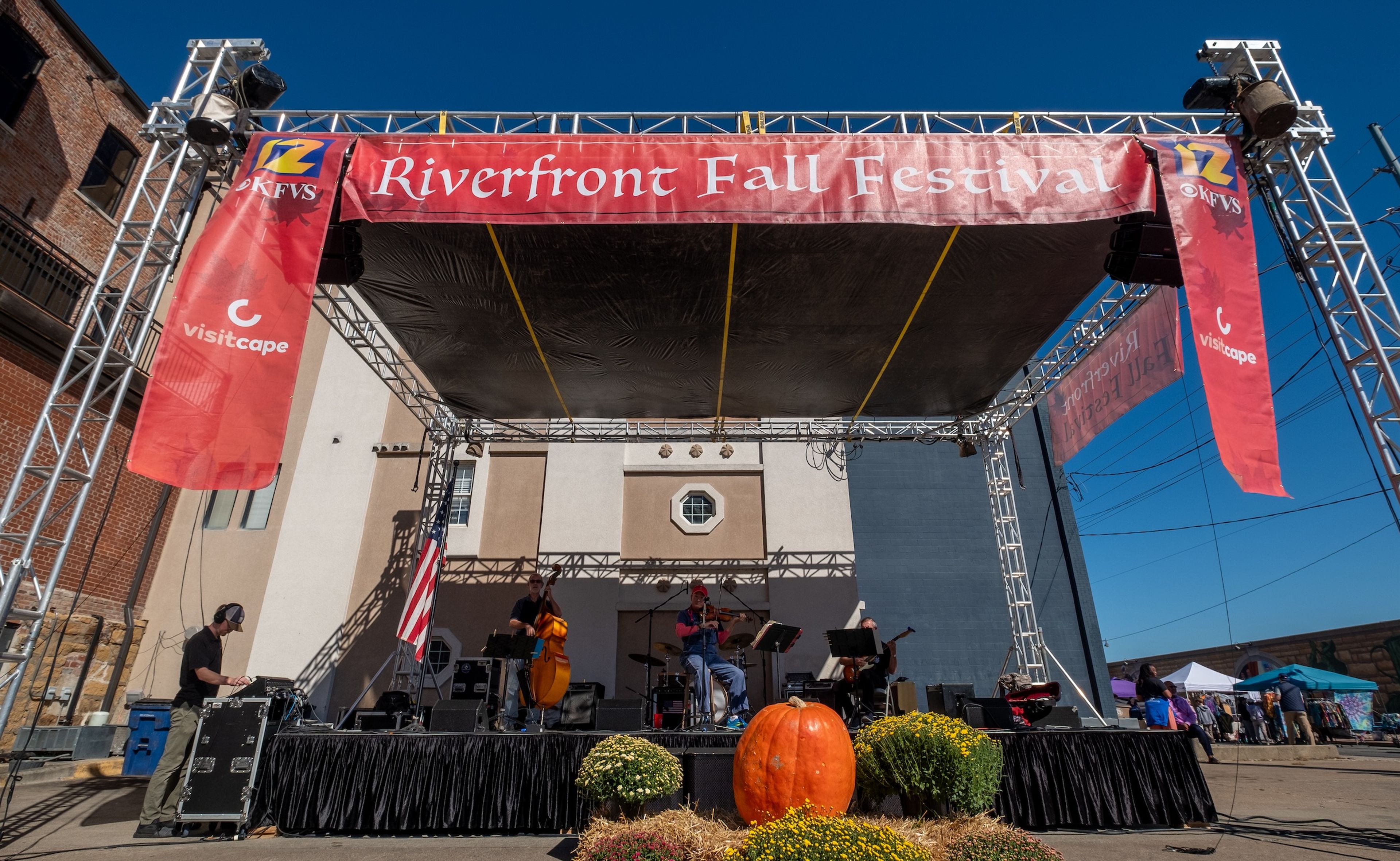 Cape Girardeau band Jumper Cables fills the air with lively music, enhancing the festive atmosphere