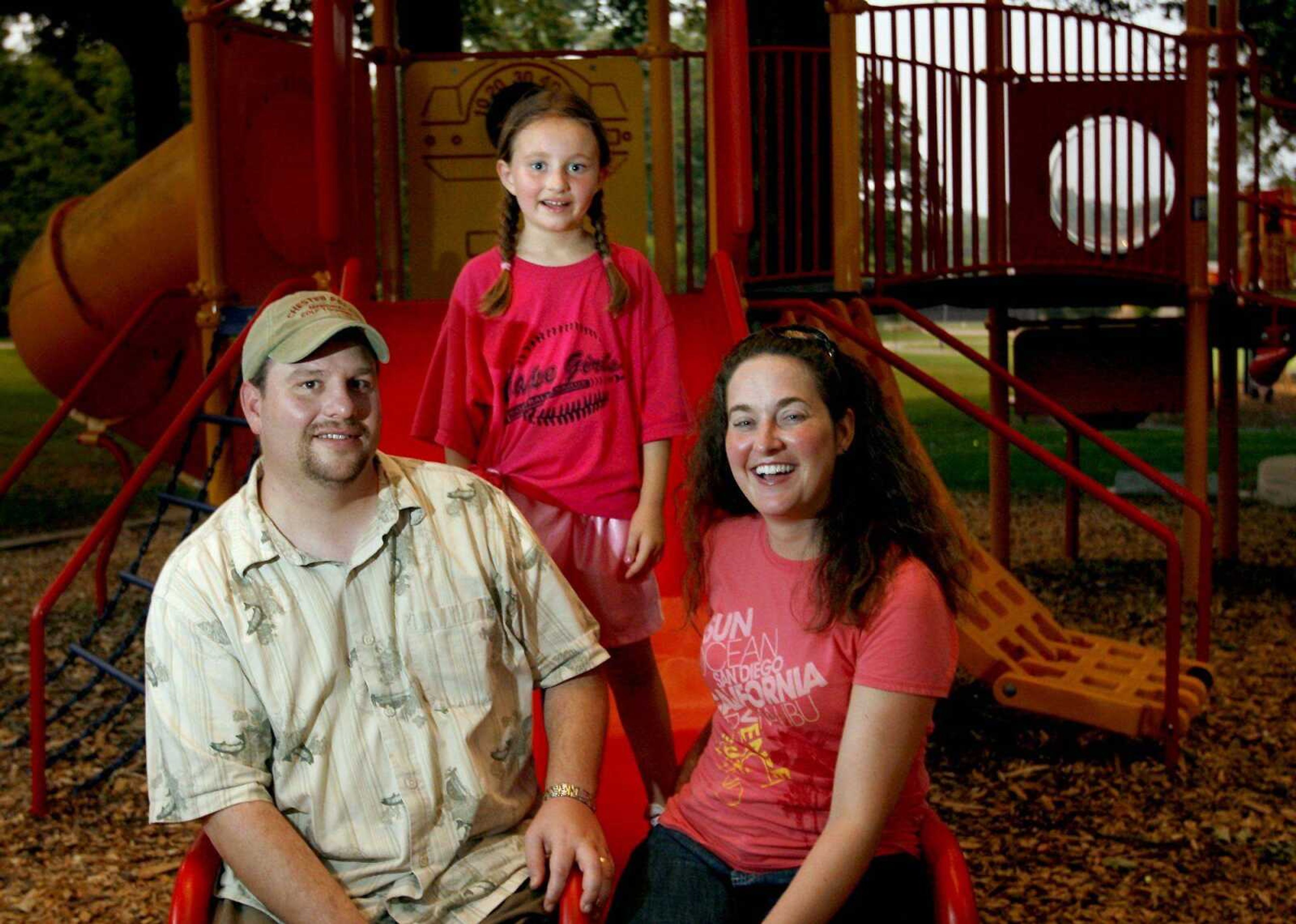 Becky Stein of Cape Girardeau, right, with her husband Robert and daughter Hallie. Stein, a teacher at Nell Holcomb, had a heart transplant in November with a heart she received from Colin Osterberg of Herculaneum, Mo.