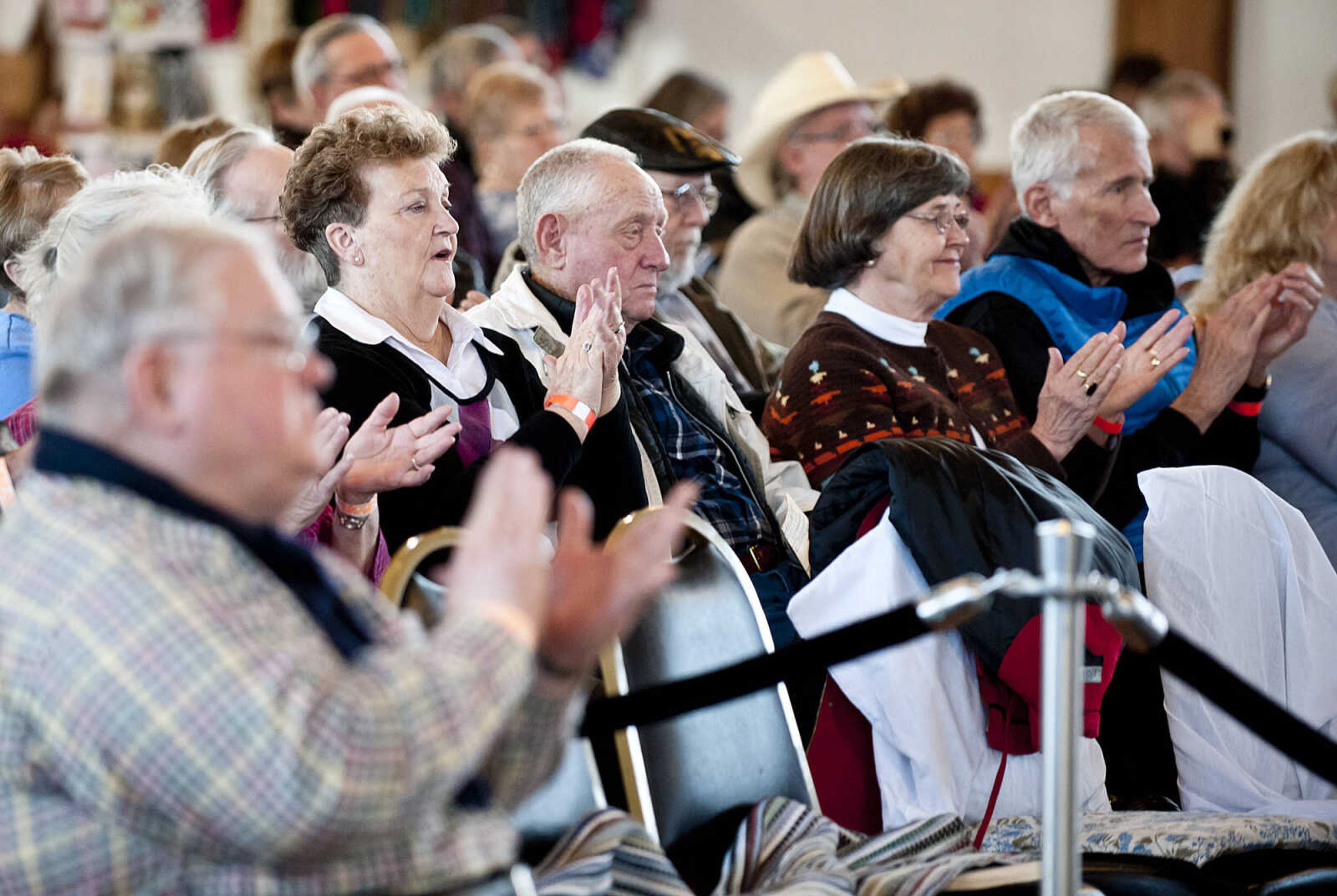 Bluegrass fans applaud during a performance by The Lewis's during a Bootheel Bluegrass Festival at the Bavarian Halle in Jackson. (Adam Vogler)