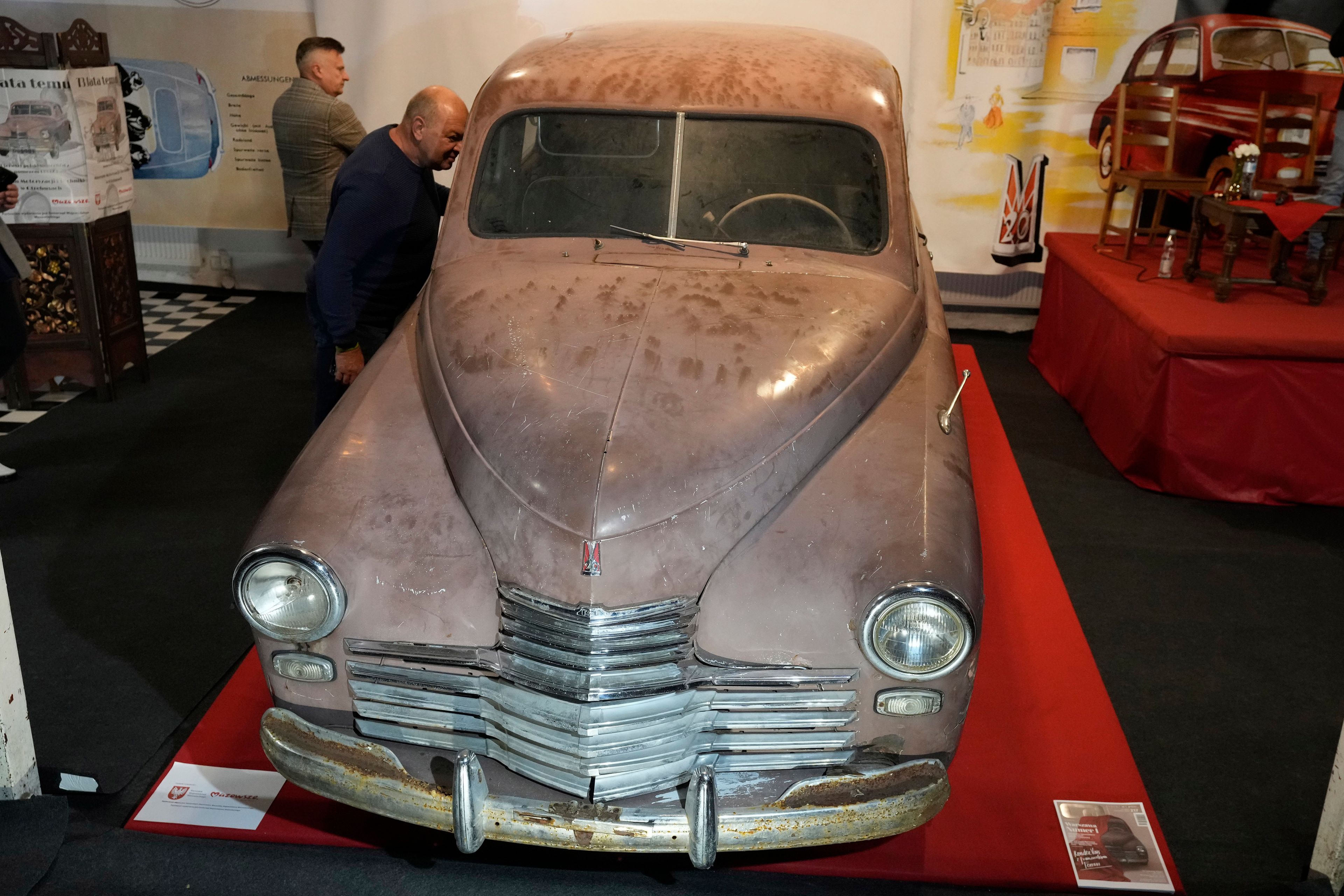 This Warszawa M-20 car with serial number 000001, based on a Soviet Union's model, was the first vehicle to leave a car factory in Poland after World War II, on Nov. 6, 1951 and now, 73 years later, it goes on public display at a private museum in Otrebusy, central Poland, on Wednesday, Nov. 6, 2024. (AP Photo/Czarek Sokolowski)