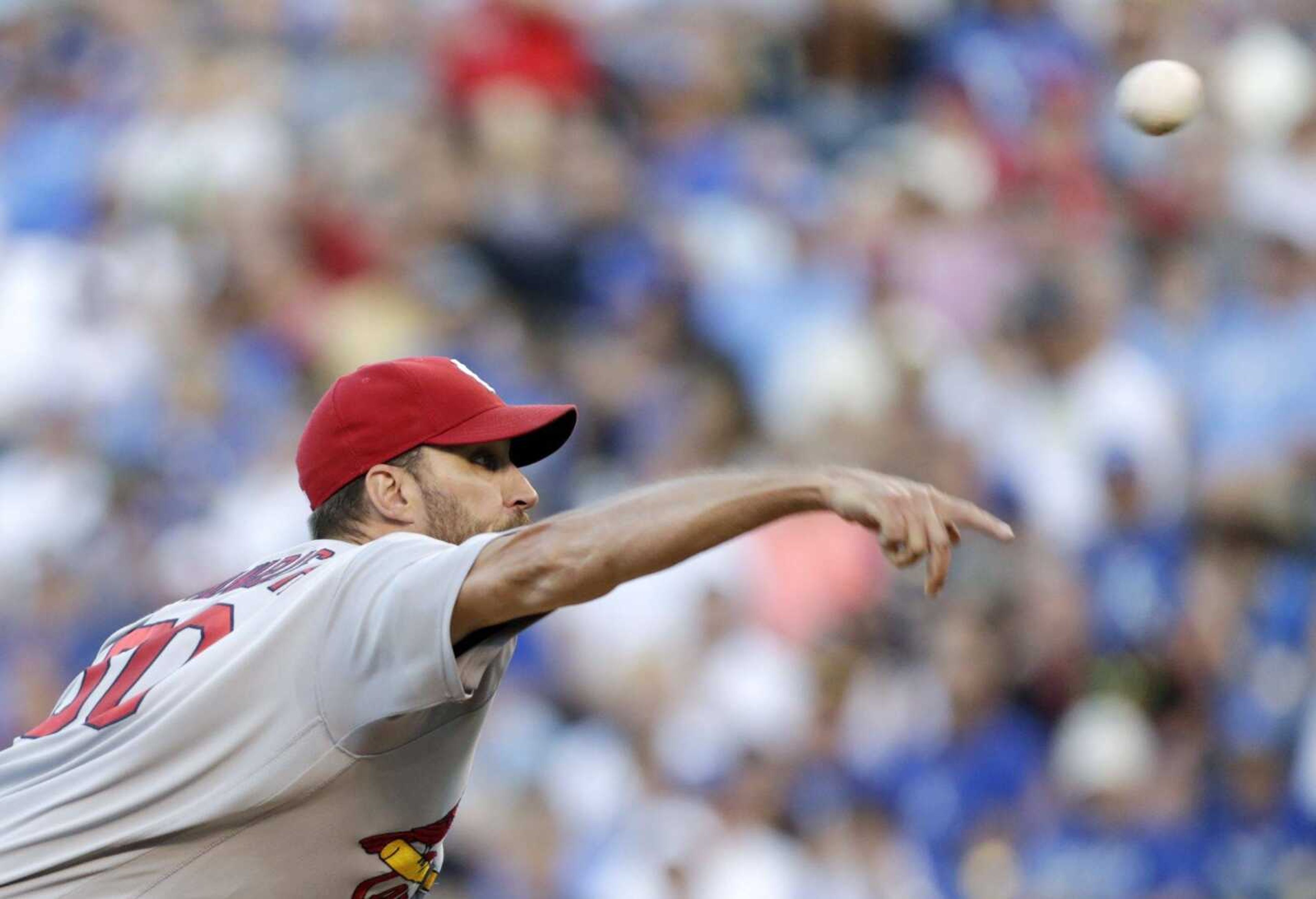 St. Louis Cardinals pitcher Adam Wainwright throws to a batter in the first inning of a baseball game against the Kansas City Royals at Kauffman Stadium in Kansas City, Mo., Monday, June 27, 2016. (AP Photo/Colin E. Braley)