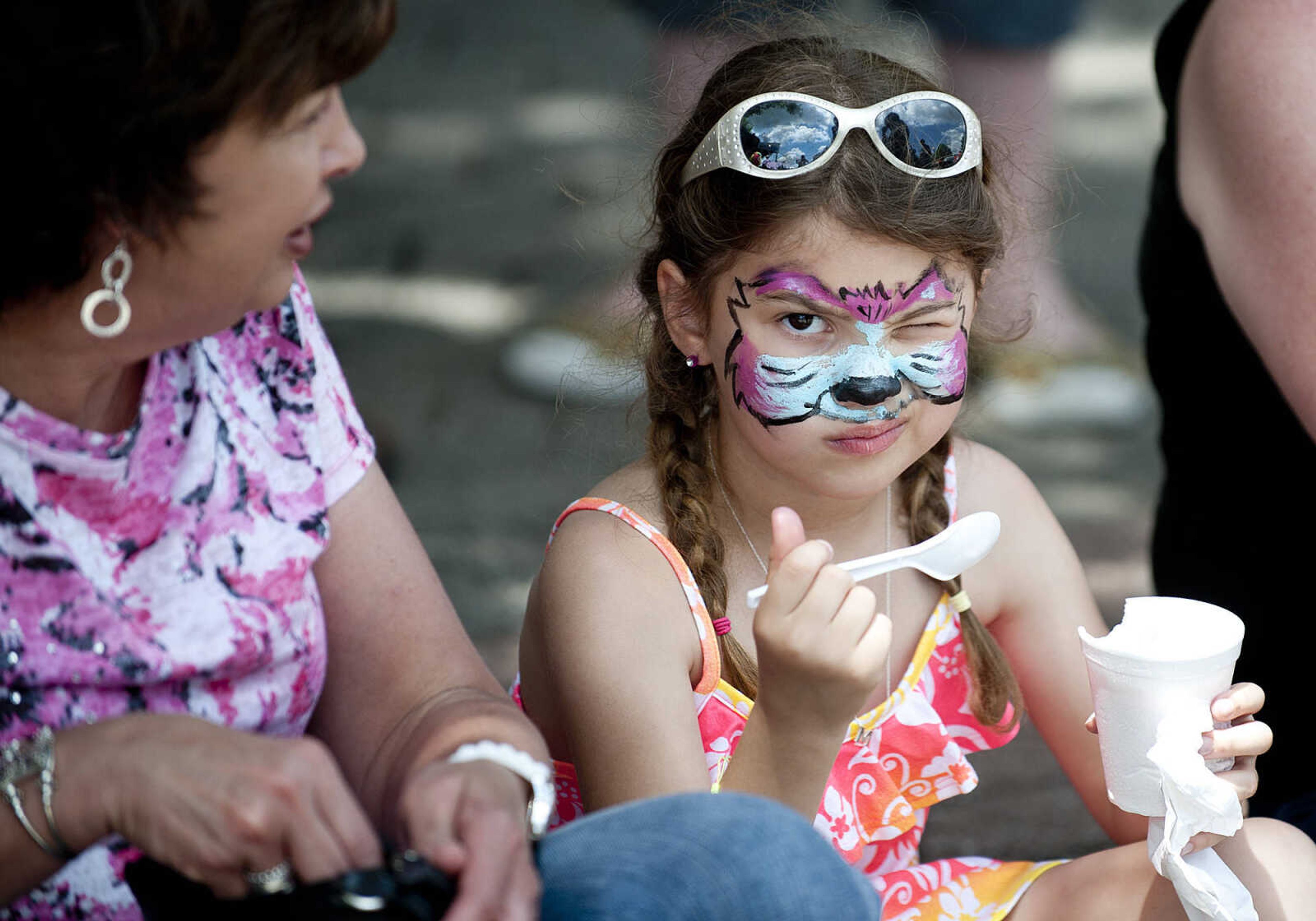 Madalyn Schemel, 5, eats some ice cream during Perryville Mayfest Saturday, May 10, in Perryville, Mo.