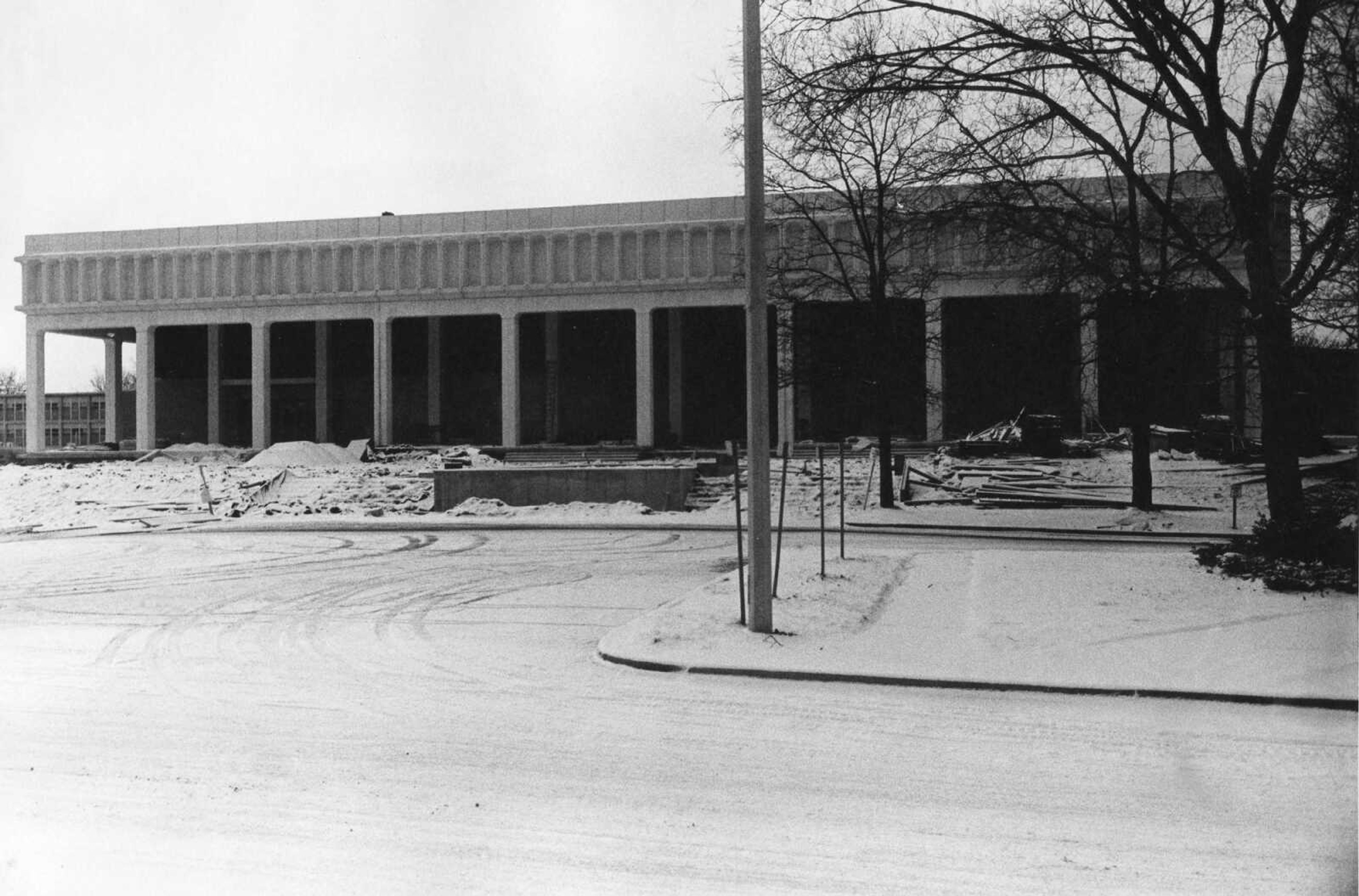 A dusting of snow coated piles of lumber and other construction debris, byproducts of the expansion of Kent Library in December 1967. (Southeast Missourian archive photo)