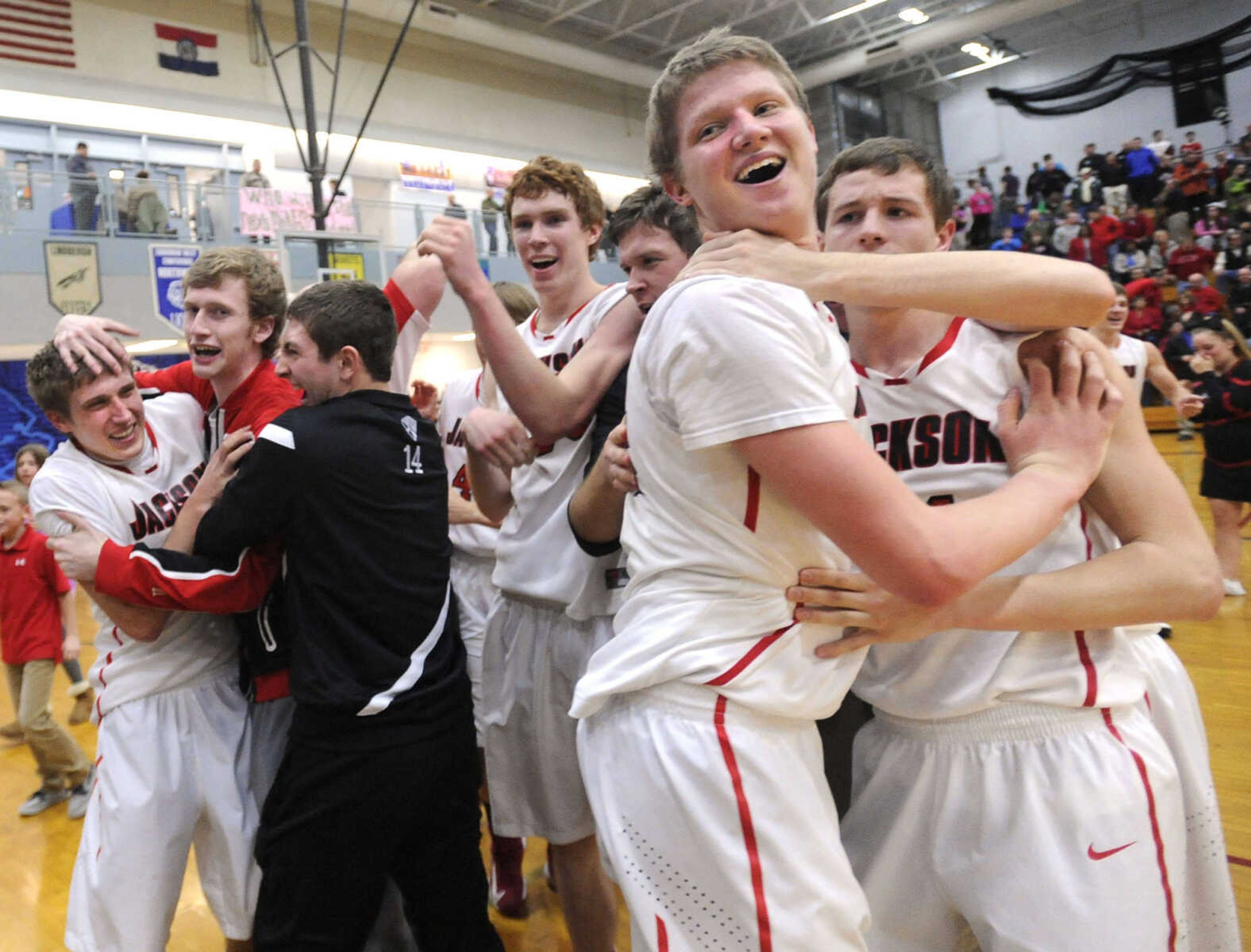 FRED LYNCH ~ flynch@semissourian.com
Jackson's Karson King celebrates with his teammates after their 60-59 win over Chaminade in the Class 5 sectional basketball game Wednesday, March 6, 2013 in Cedar Hill, Mo.