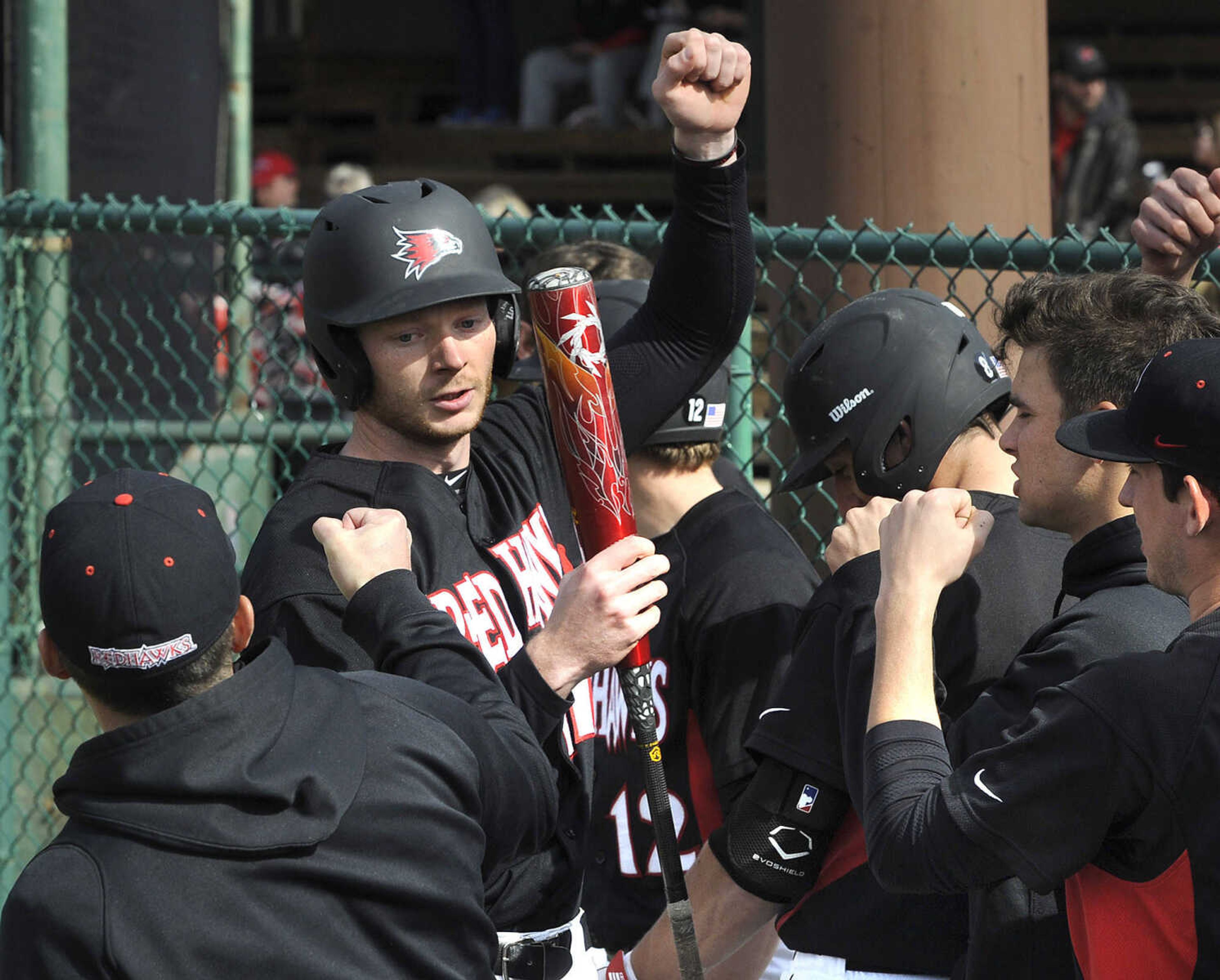 Southeast Missouri State's Brendon Neel is congratulated after lead-off home run against UT Martin during the second inning Friday, March 20, 2015 at Capaha Field. (Fred Lynch)