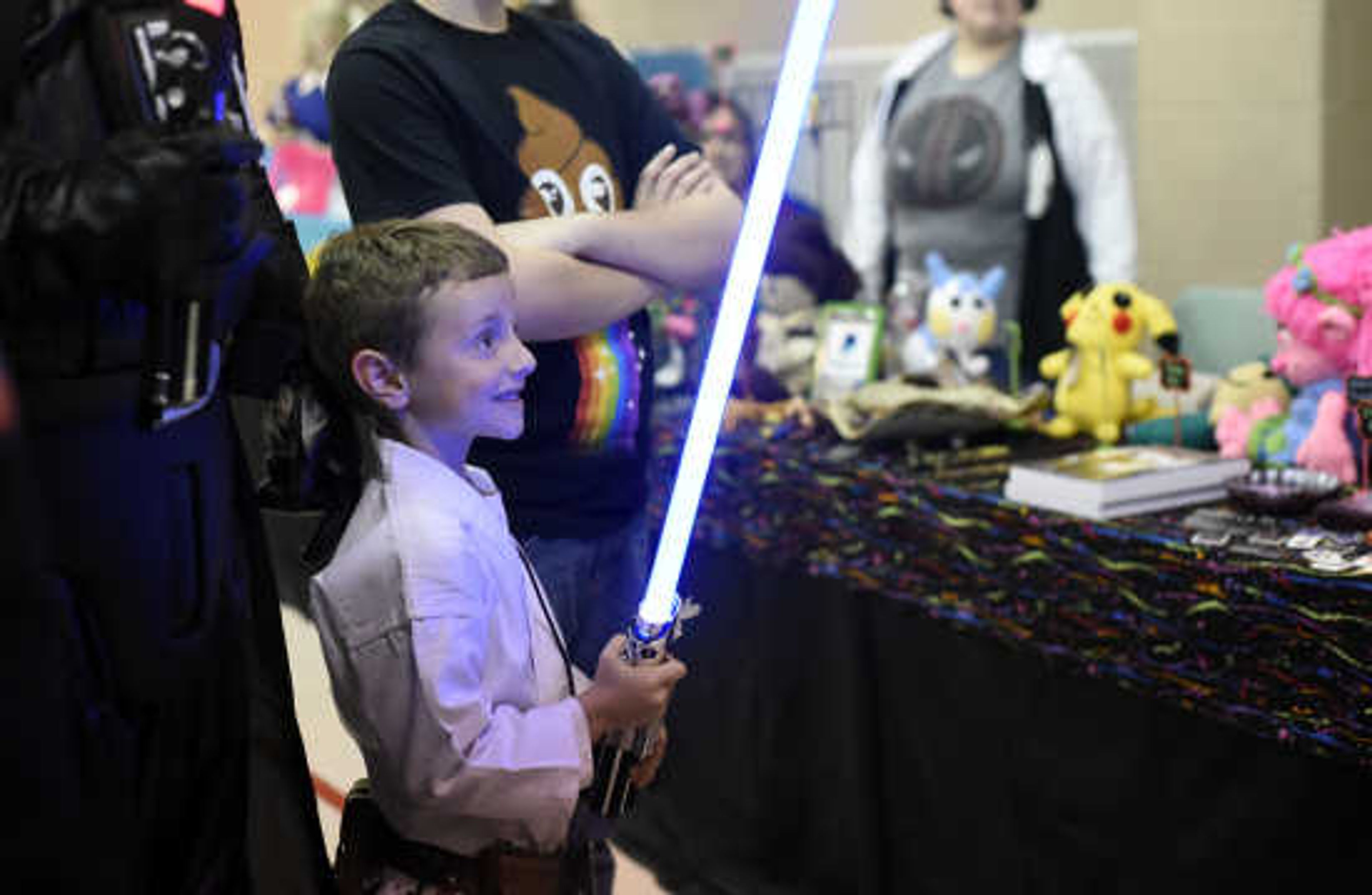 Luc Shleton, dressed as Luke Skywalker, uses his lightsaber during the 12th annual Cape Comic Con on Saturday, April 22, 2017, at the Osage Centre in Cape Girardeau.