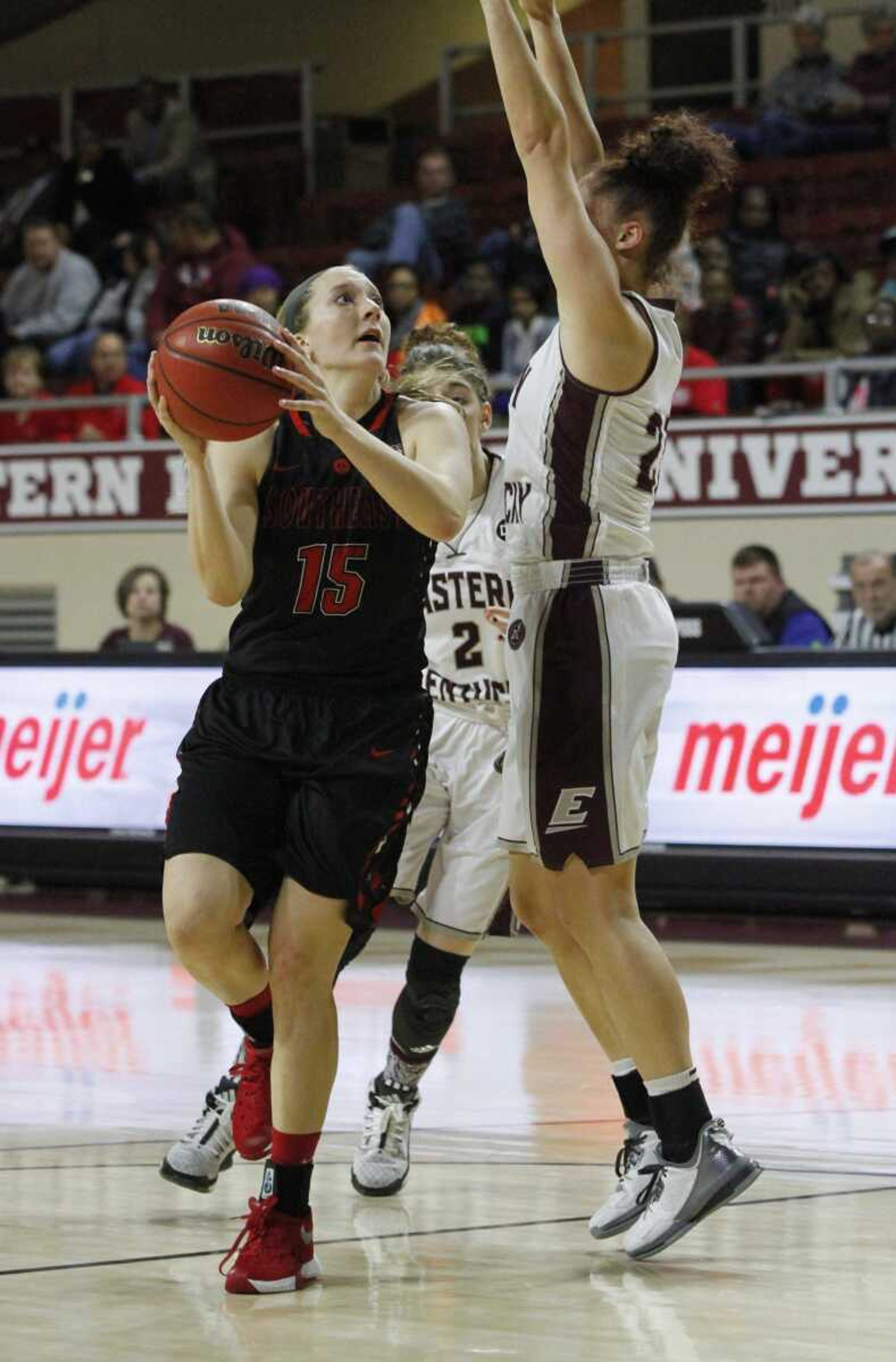 Southeast Missouri State's Kaley Leyhue puts up a shot while being defended by an Eastern Kentucky player in the first half of Saturday's game in Richmond, Kentucky. The Colonels won 56-55. (Nathan Hutchinson ~ Richmond Register)