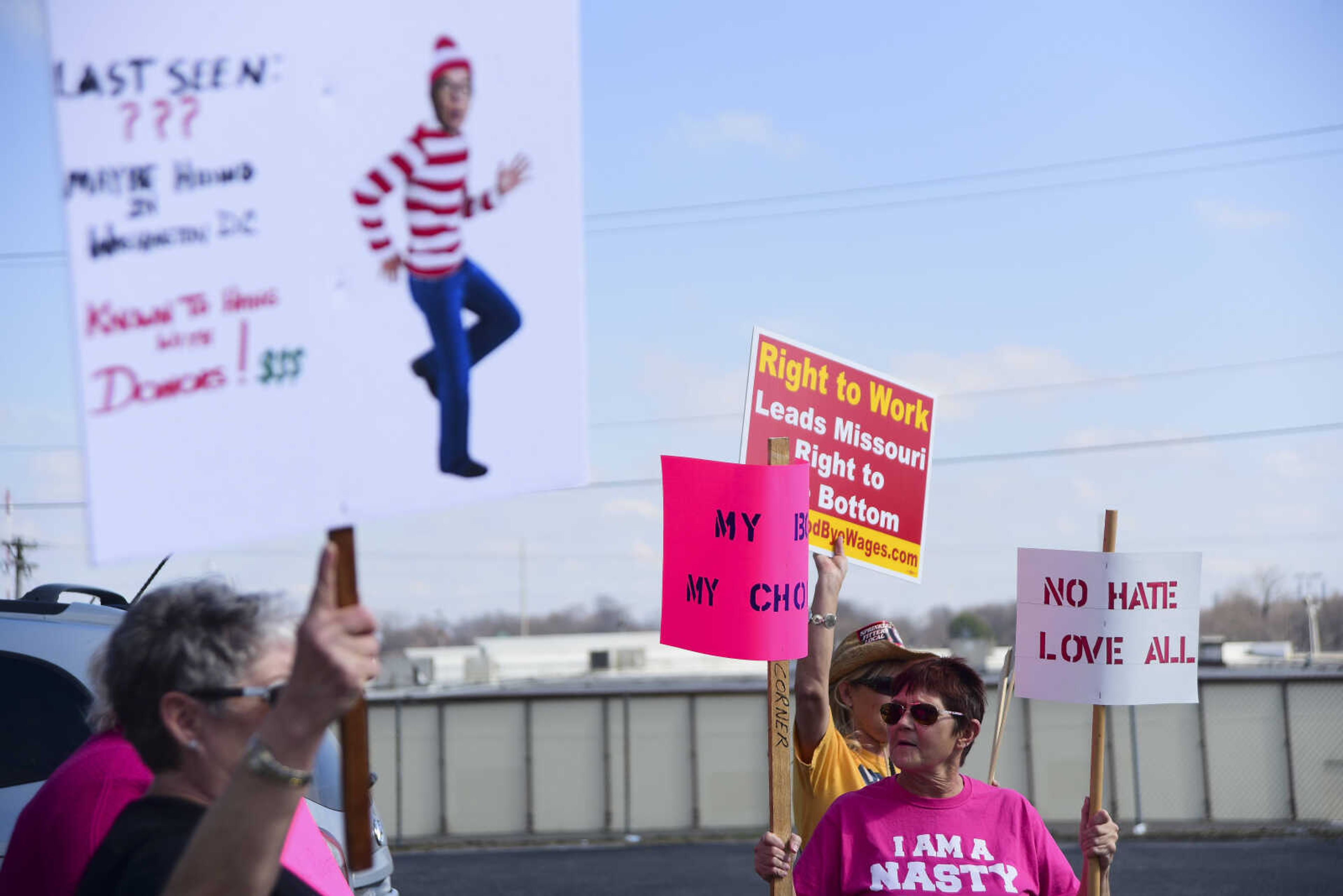 About 50 people with the Liberal Women Unite-Southeast MO Chapter demonstrate in front of U.S. Sen. Roy Blunt's office Wednesday, Feb. 22, 2017 in Cape Girardeau. Protestors held signs and chanted "Where's Roy" to demand a Town Hall Meeting with Senator Roy Blunt. As they spoke with the District Director, Darren Lingle, they brought up concerns they had along with saying they were not paid to be there with some having to even take vacation time to state what they believe in.