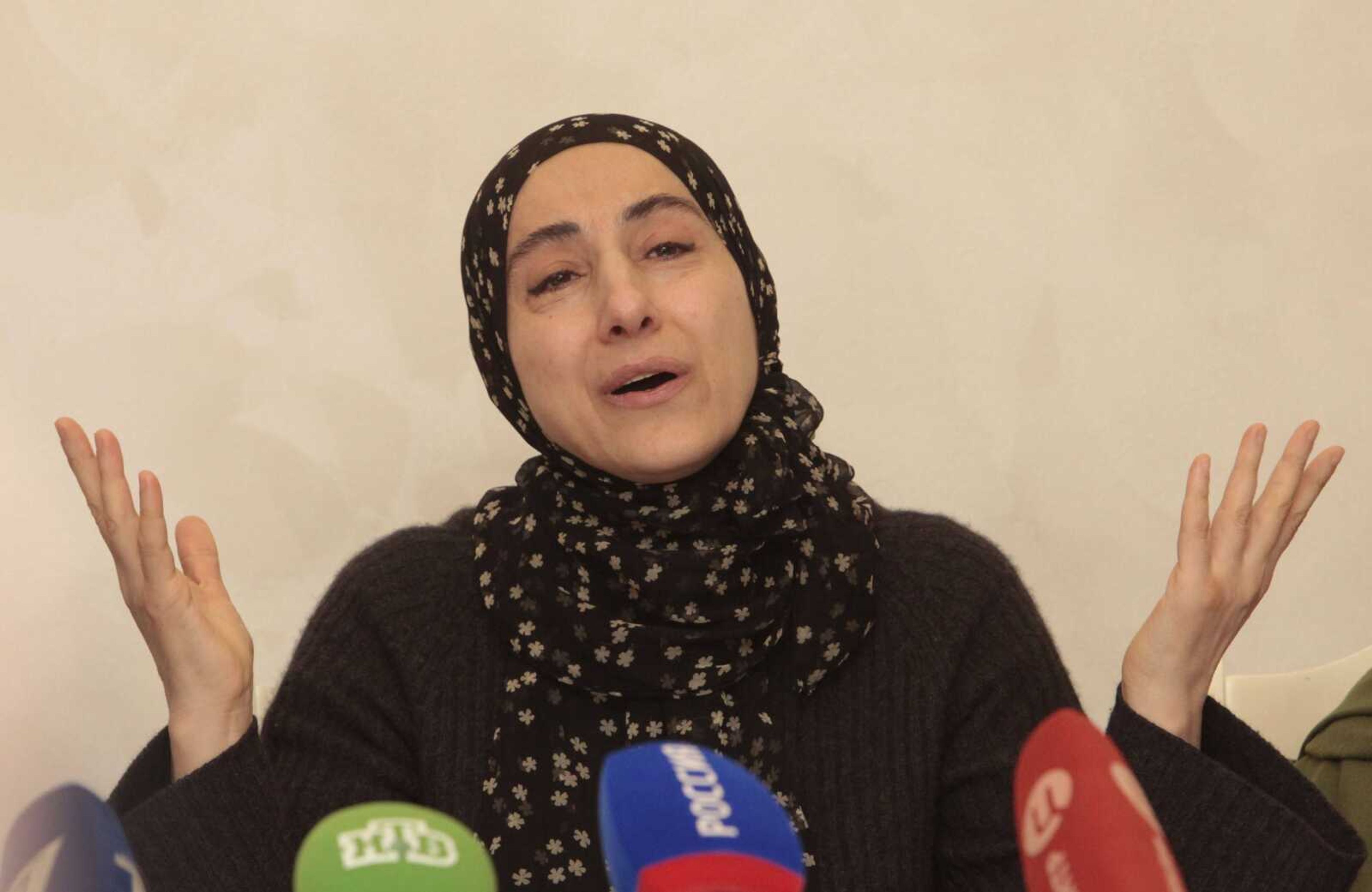 The mother of the two Boston bombing suspects, Zubeidat Tsarnaeva, speaks at a news conference in Makhachkala, the southern Russian province of Dagestan, Thursday, April 25, 2013. The father of the two Boston bombing suspects said Thursday that he is leaving Russia for the United States in the next day or two, but their mother said she was still thinking it over. (AP Photo/Musa Sadulayev)