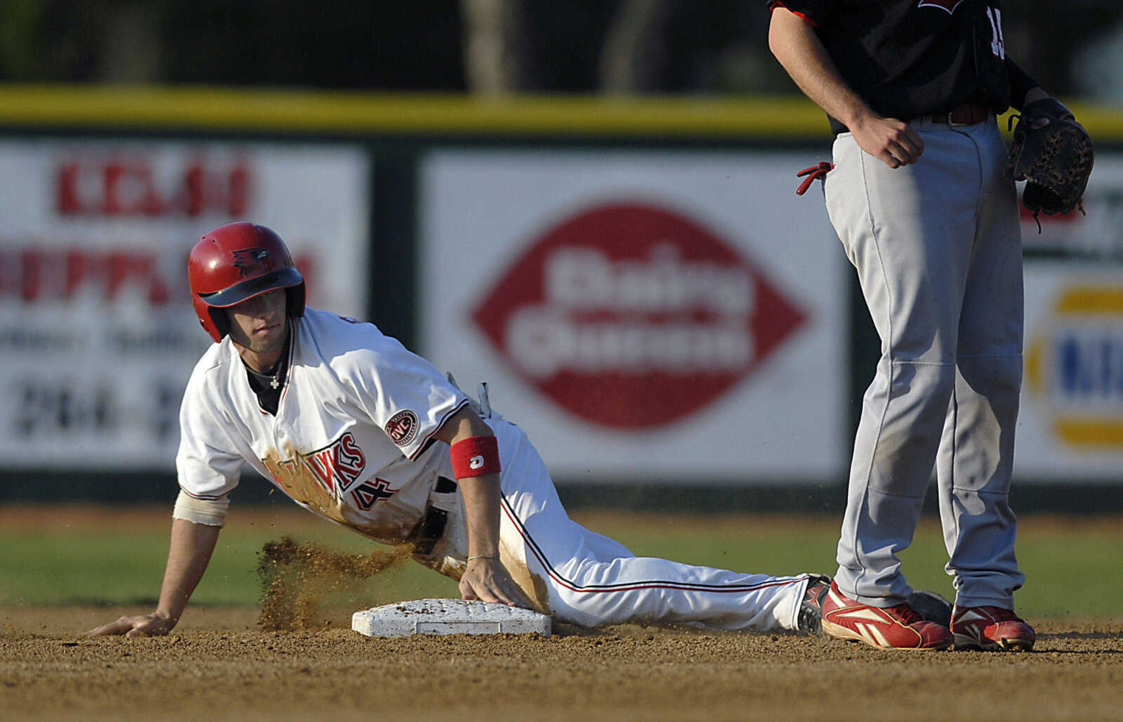 KIT DOYLE ~ kdoyle@semissourian.com
Dirt falls from Kenton Parmley after he stole second base Friday, April 17, 2009, at Capaha Field.