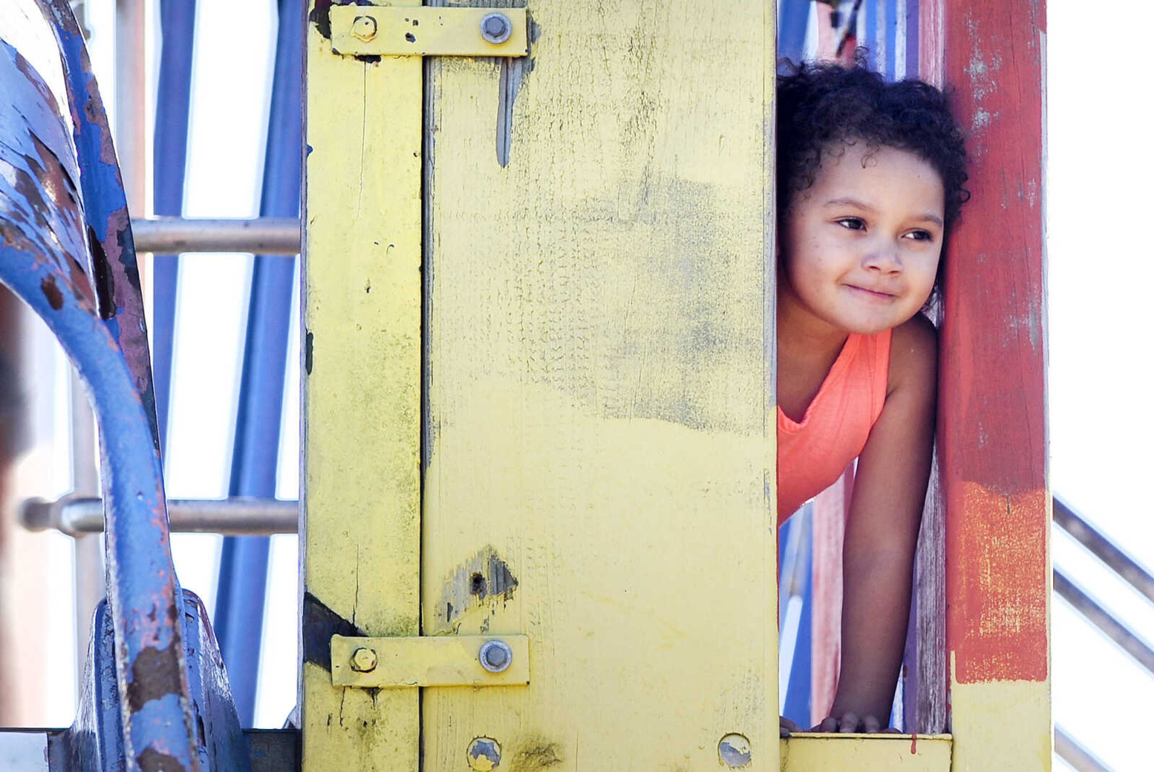 LAURA SIMON ~ lsimon@semissourian.com

Aliyah Combs, 4, peeks out from the tower of the playground at Cape County Park South on Monday, April 4, 2016.