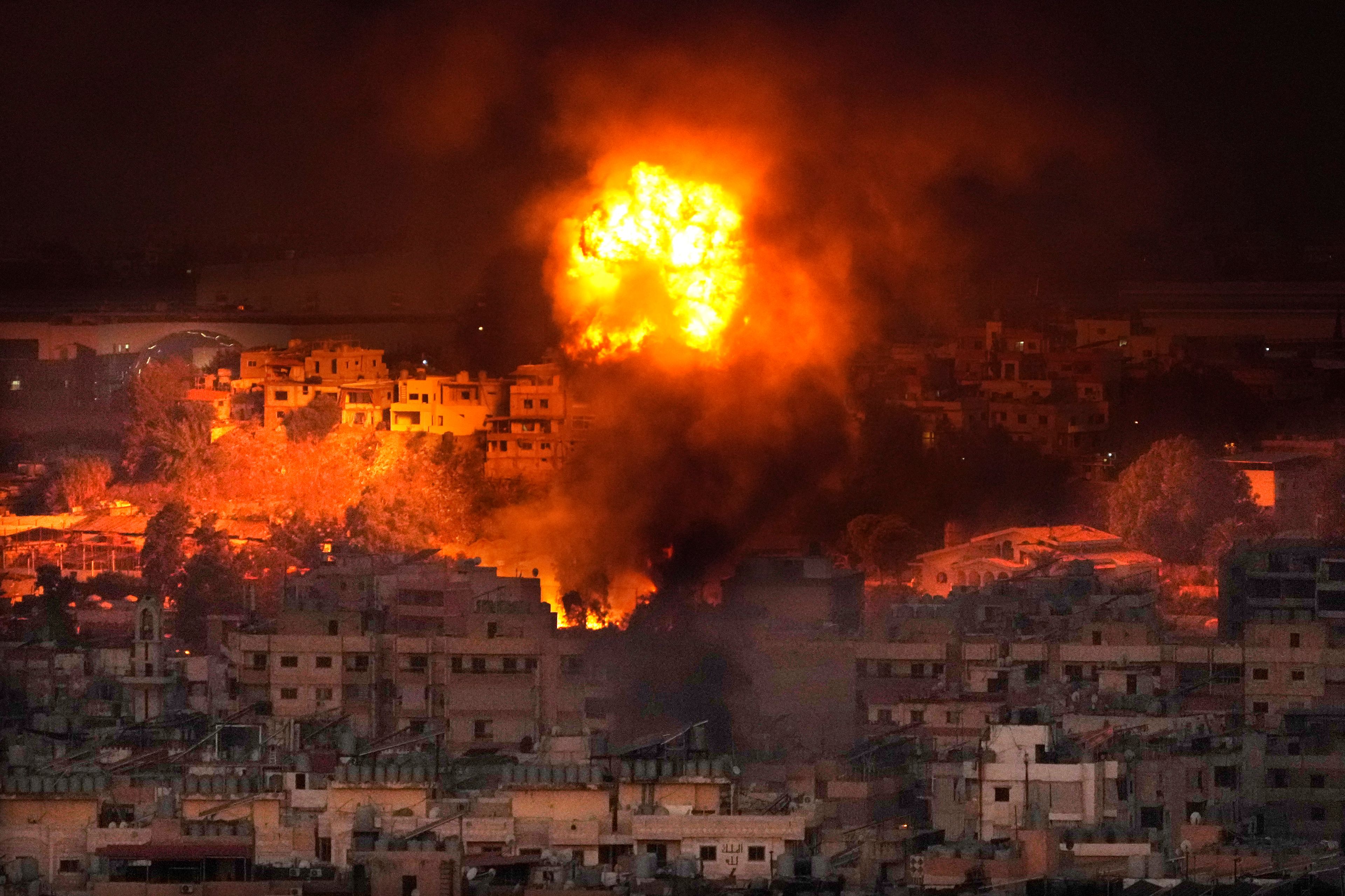 Flames rise after an Israeli airstrike in the southern suburbs of Beirut, Lebanon, Saturday, Sept. 28, 2024. (AP Photo/Hussein Malla)