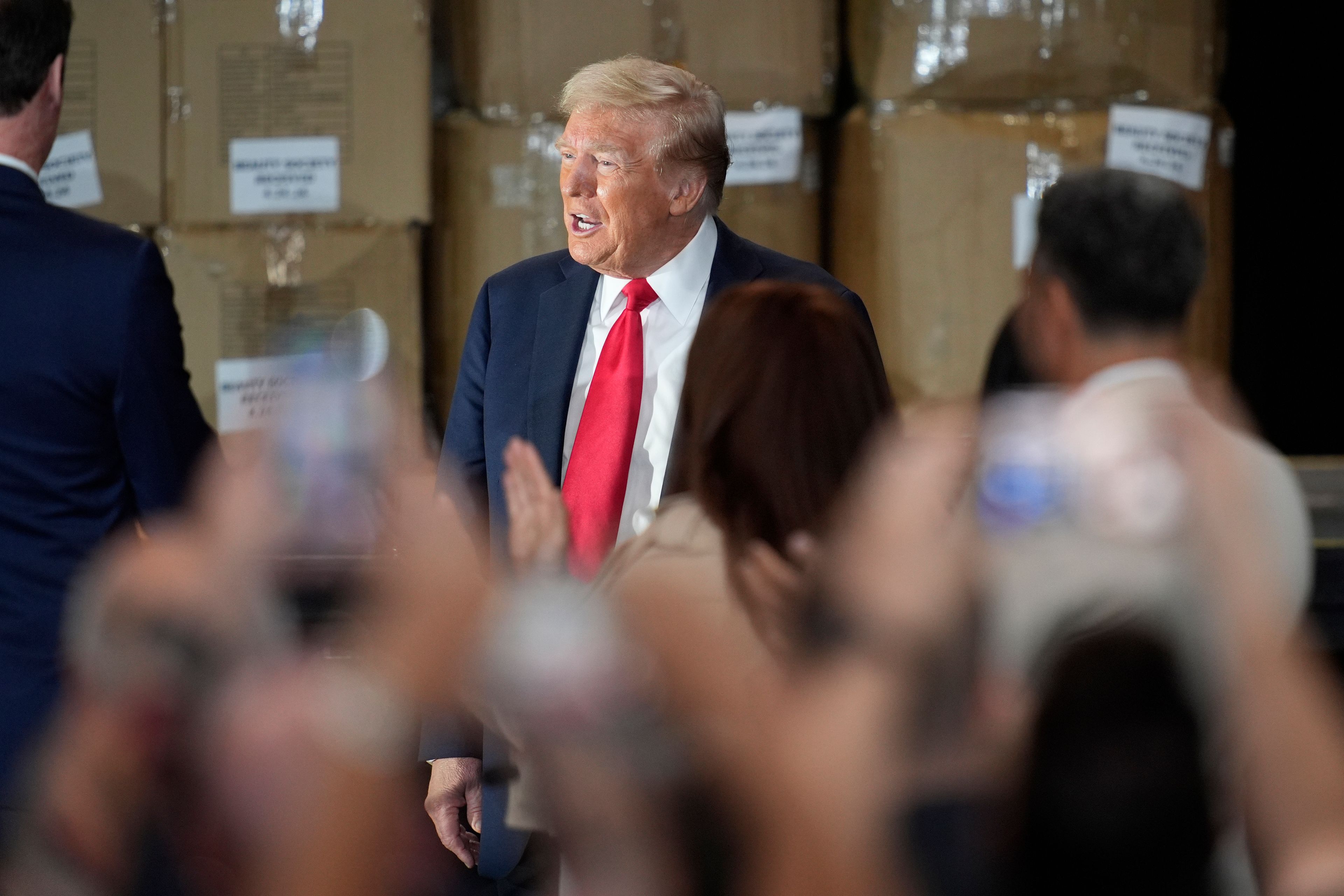 Republican presidential nominee former President Donald Trump arrives to speak at a campaign event at Beauty Society, Saturday, Oct. 12, 2024, in North Las Vegas, Nev. (AP Photo/John Locher)