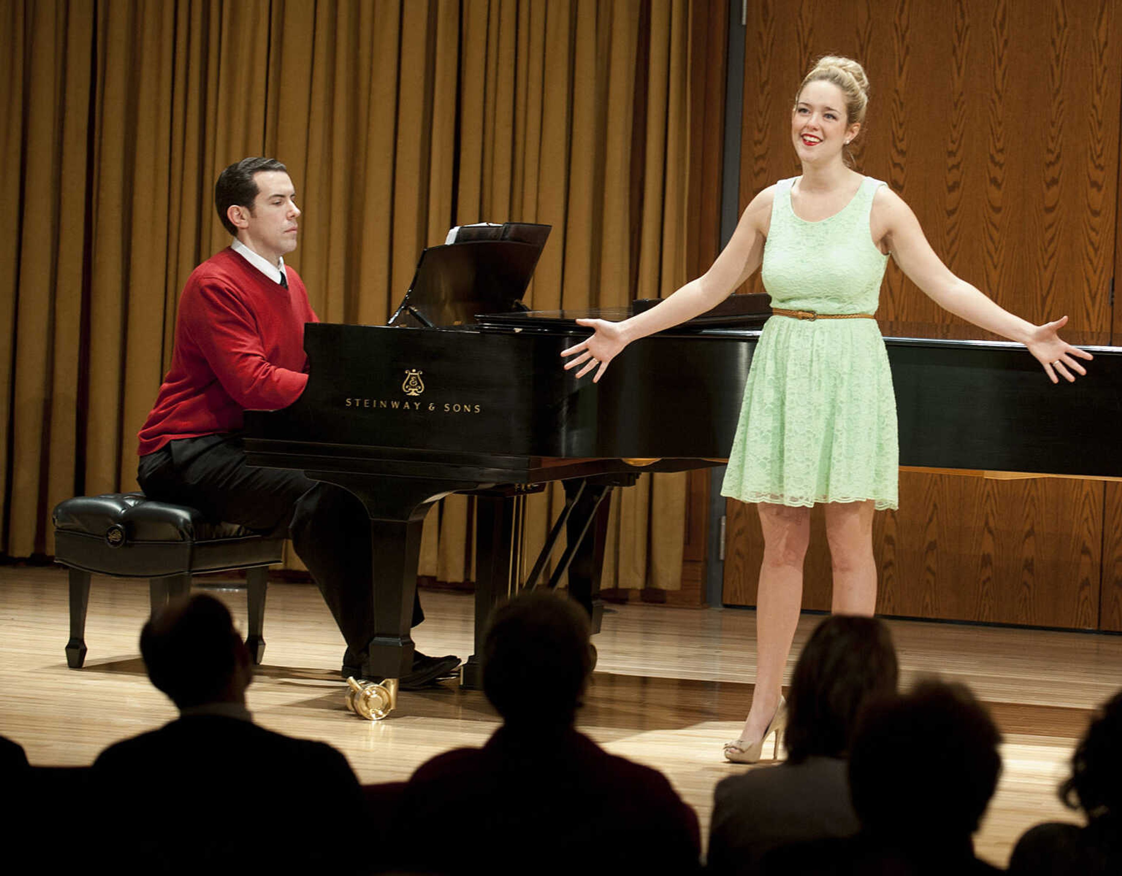 Southeast Missouri State University student Molly Dowd, right, is accompanied on piano by musical theatre instructor Joe Mason as she sings "The Fire Within Me," from the musical "Little Women," during the Class Voice III Recital Sunday, Dec. 15, at the Shuck Recital Hall. Fifteen Southeast students performed during the annual recital which is in its sixth year.