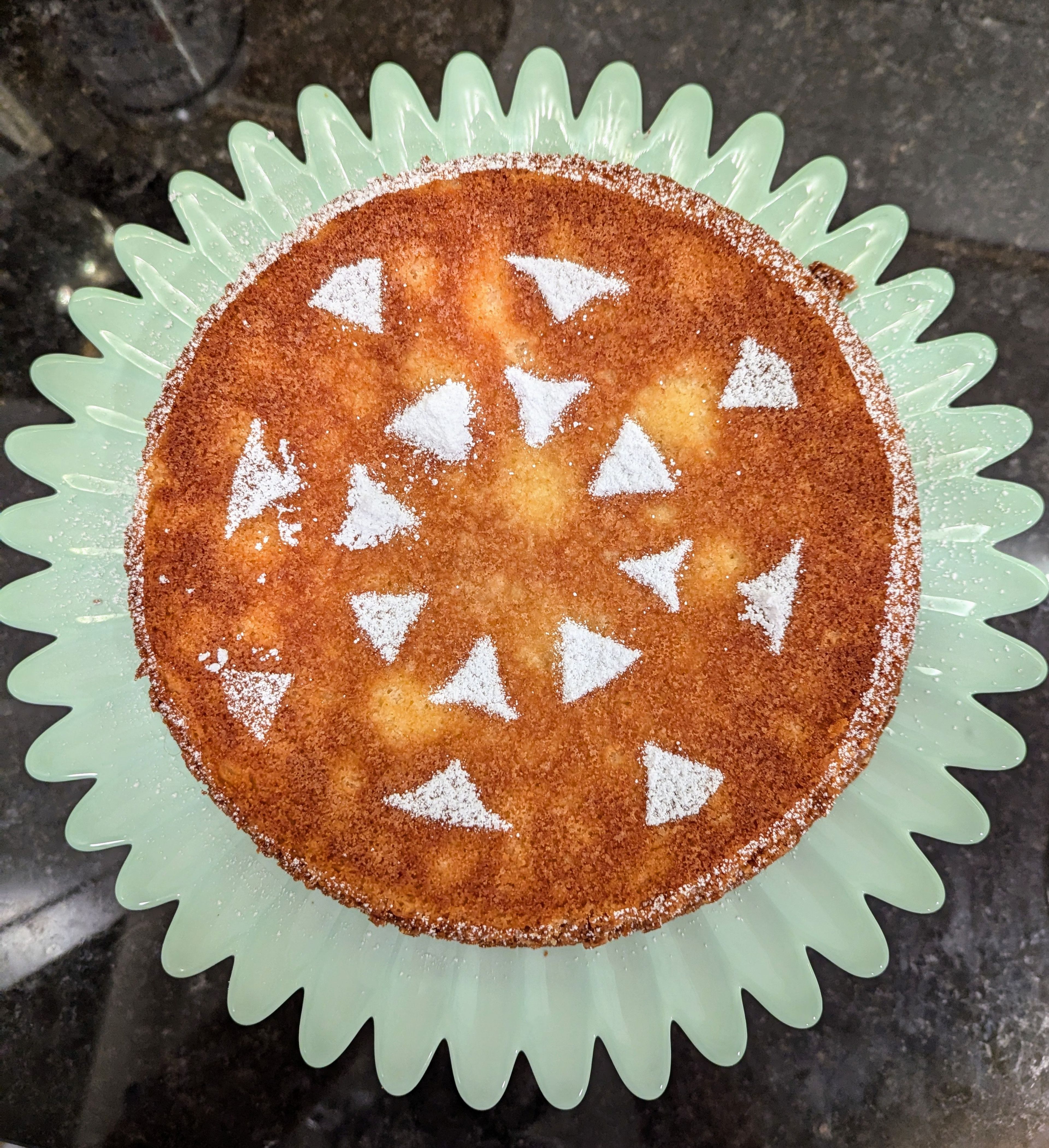 A simple but elegant almond cake, typical of the many sophisticated recipes in The Artist in the Kitchen, a compendium of recipes from the St. Louis Art Museum.