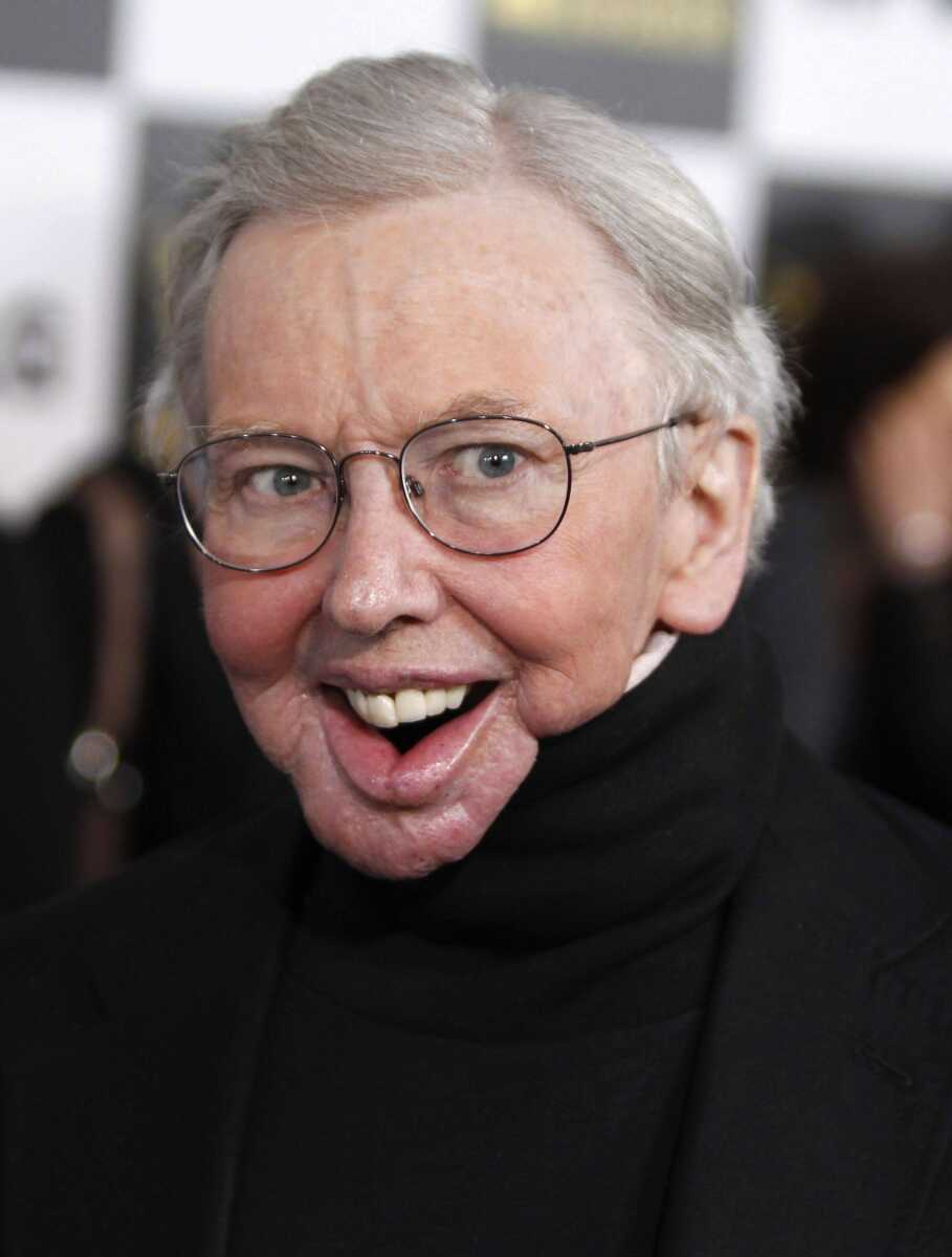 FILE - In this March 5, 2010 file photo, Roger Ebert arrives at the Independent Spirit Awards in Los Angeles. The Pulitzer Prize-winning critic, who lost his ability to speak and eat after cancer surgeries, said Friday, Sept. 10, 2010, that he will appear in a special segment on the television movie review show "Roger Ebert Presents At the Movies" he is producing with his wife, Chaz Ebert.The weekly, half-hour review program will debut in January and be syndicated nationally on public television stations. (AP Photo/Matt Sayles, File)