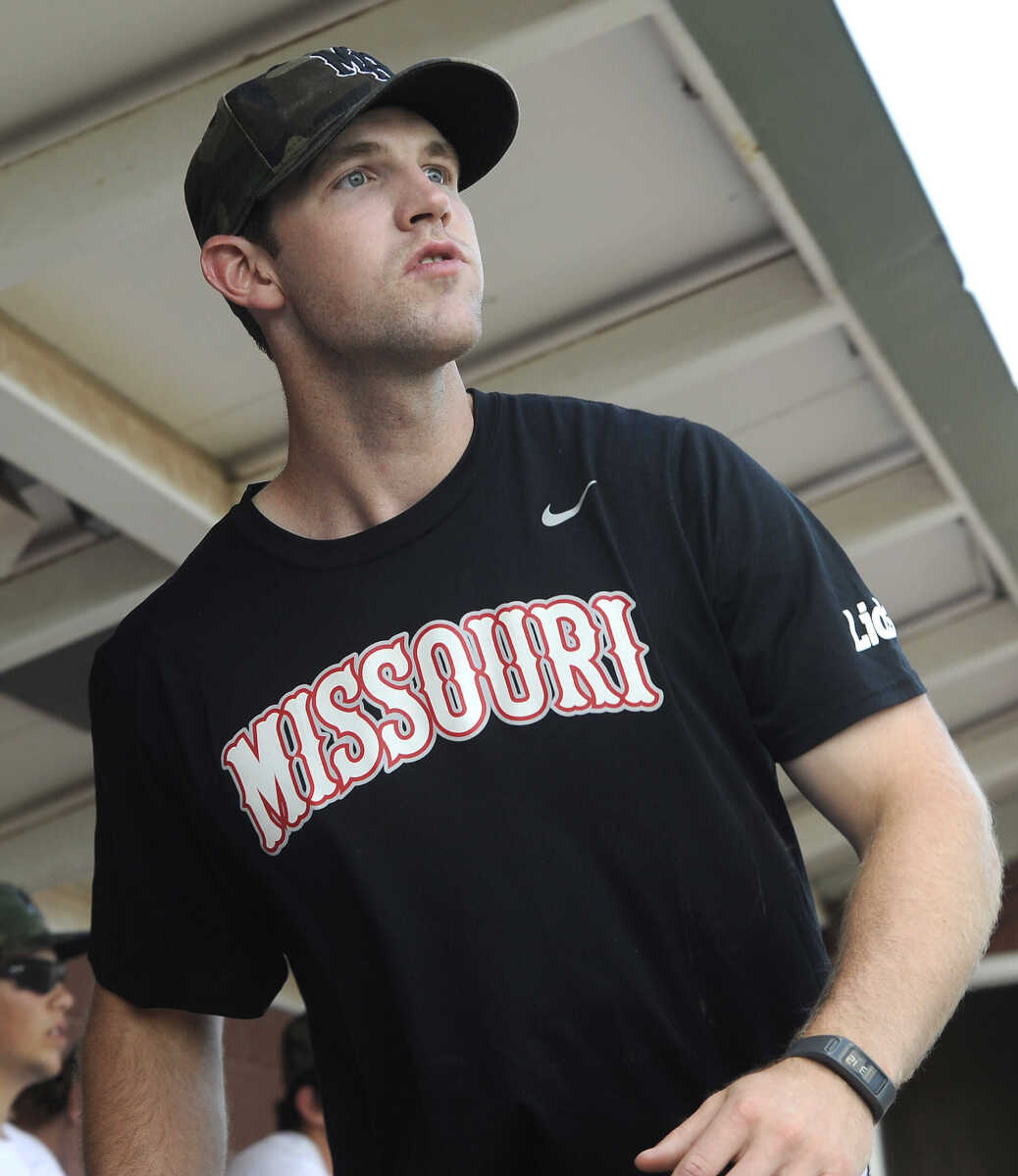 Lids Missouri Bulls coach Trenton Moses watches his players from the dugout Thursday, July 23, 2015 in St. Louis. (Fred Lynch)