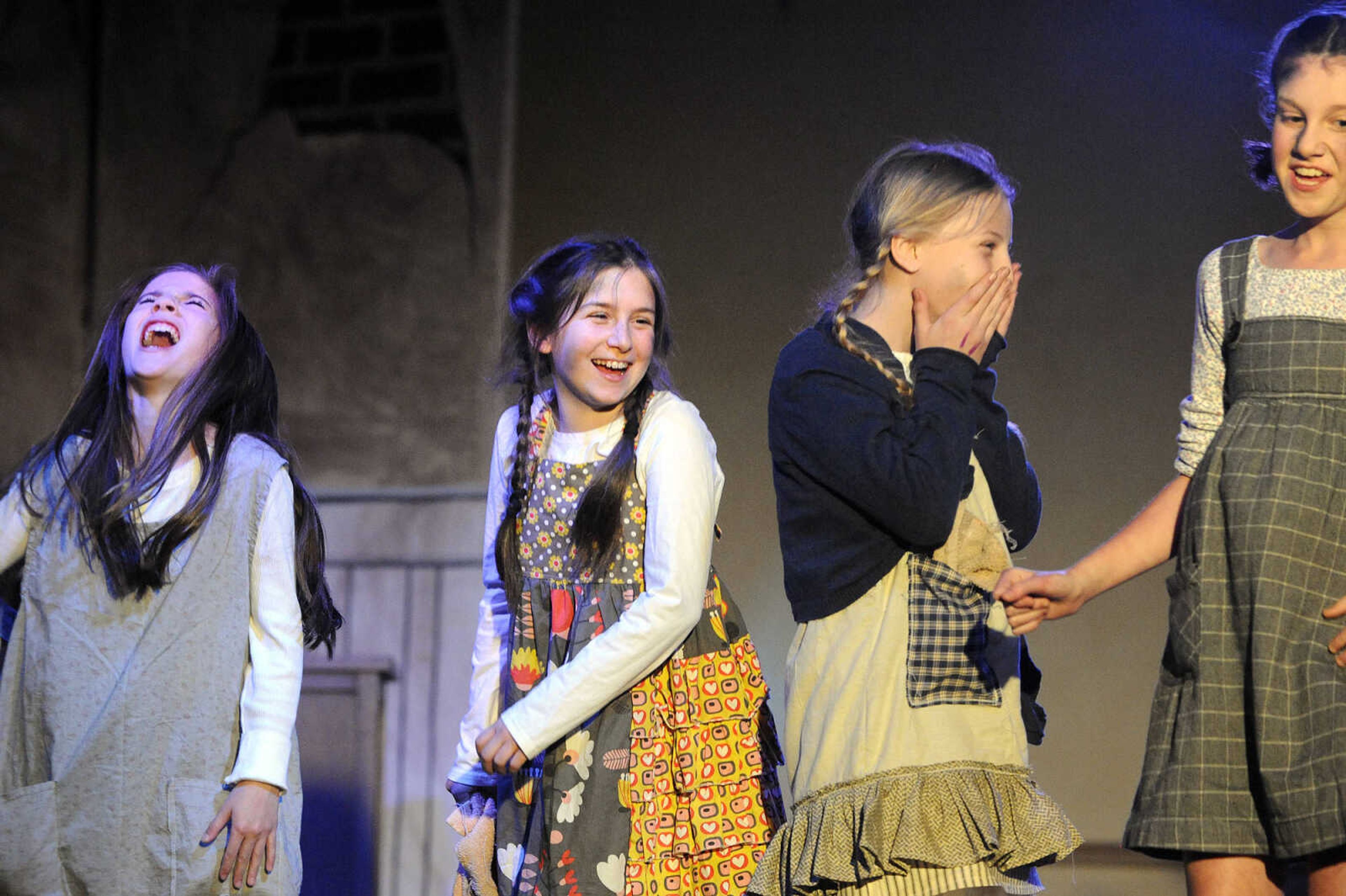 LAURA SIMON ~ lsimon@semissourian.com

Cast members rehearse for "Annie Jr." Wednesday night, May 4, 2016, at The Venue in Cape Girardeau. The condensed version of "Annie" is being produced by On Cue Performing Arts Studio, and the not-for-profit local theater group Acting Out!.