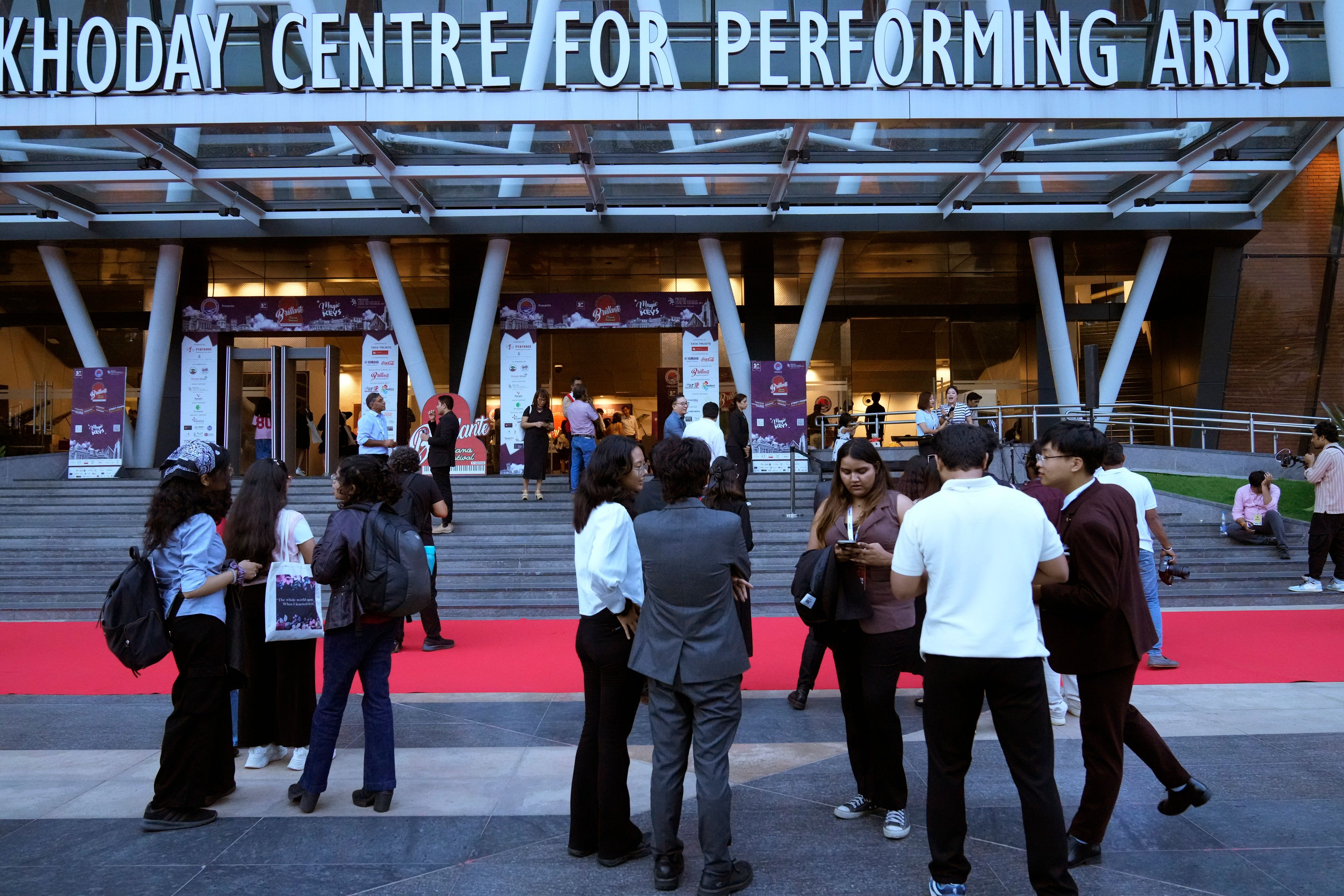 People arrive to watch performances during the two-day Brillante Piano Festival in Bengaluru, India, Sunday, Sept. 29, 2024. (AP Photo/Aijaz Rahi)