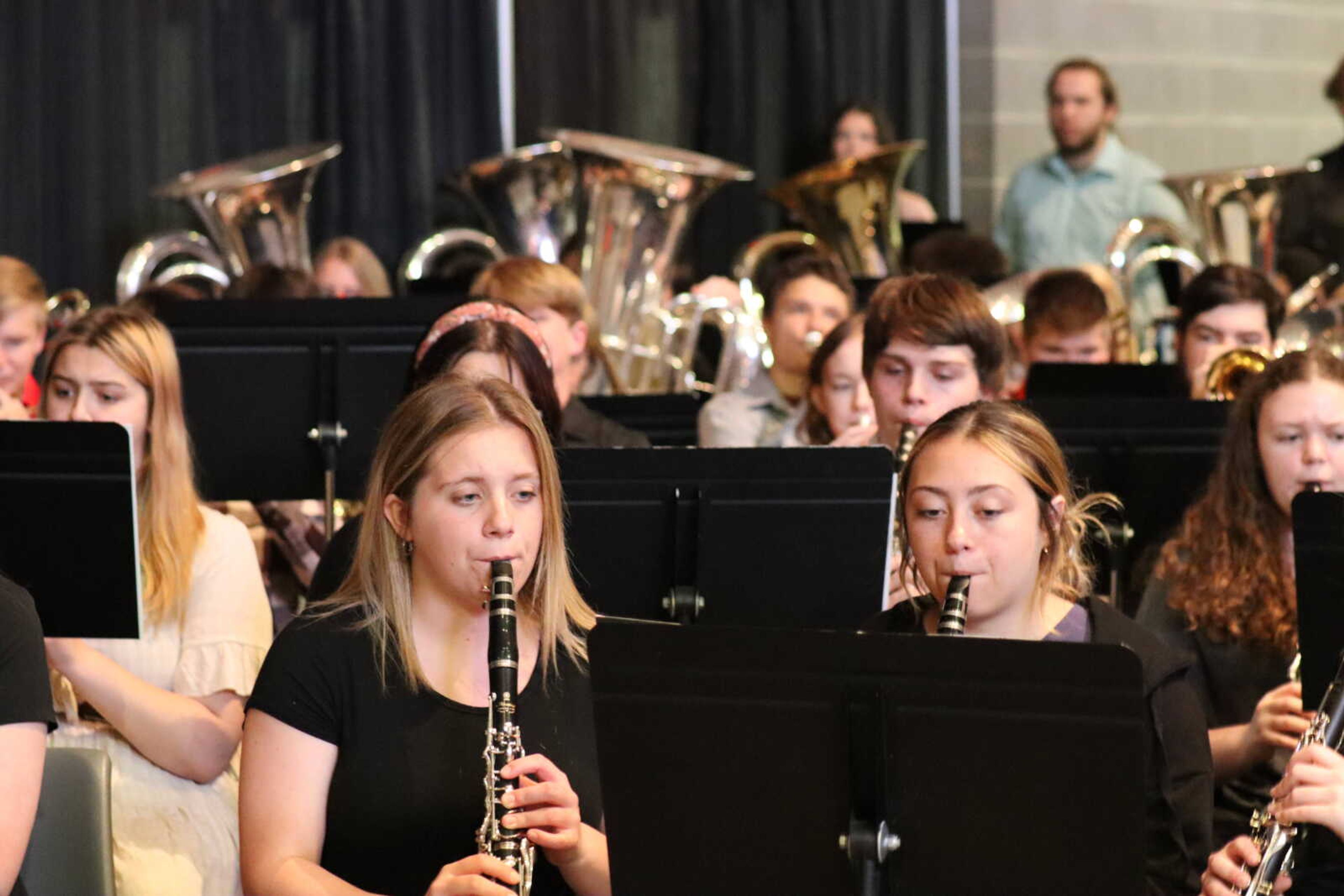 Jackson High School Band plays through the processsional while graduates make their way to the seats.