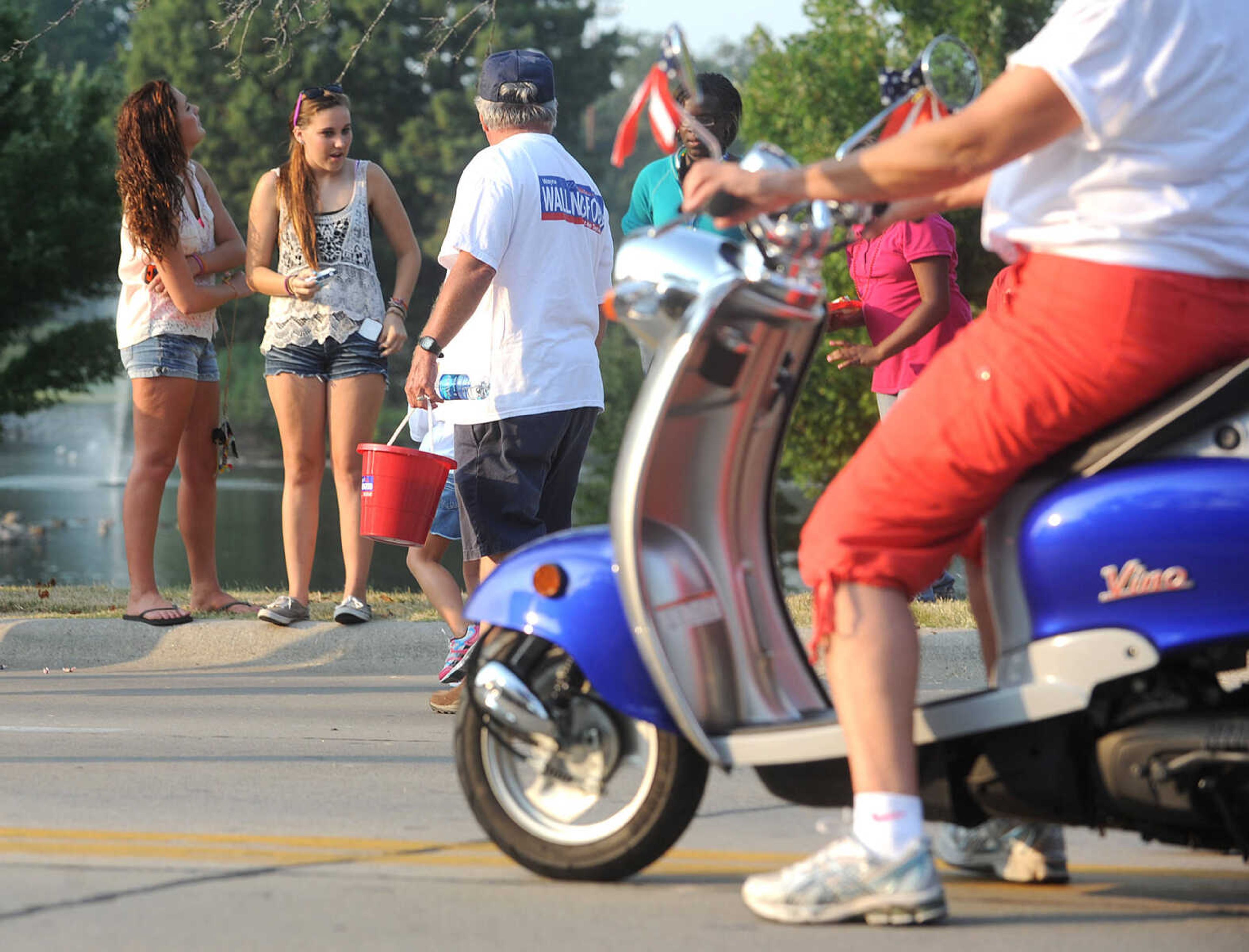 LAURA SIMON ~ lsimon@semissourian.com

The SEMO District Fair Parade moves along Broadway towards Arena Park, Monday, Sept. 9, 2013, in Cape Girardeau.