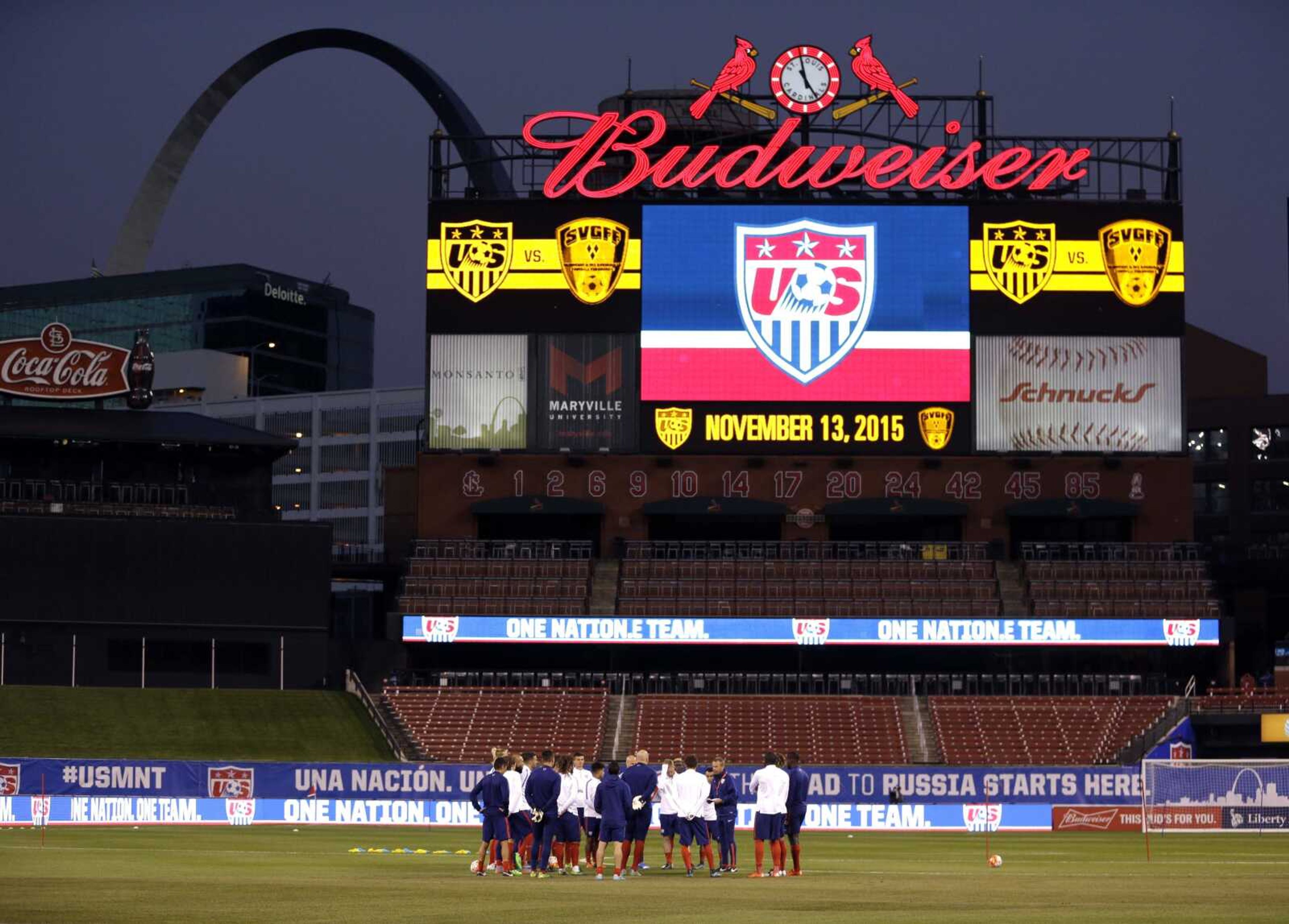 Members of the United States men's national soccer team gather at midfield at the start of practice in November at Busch Stadium in St. Louis. (Jeff Roberson ~ Associated Press)