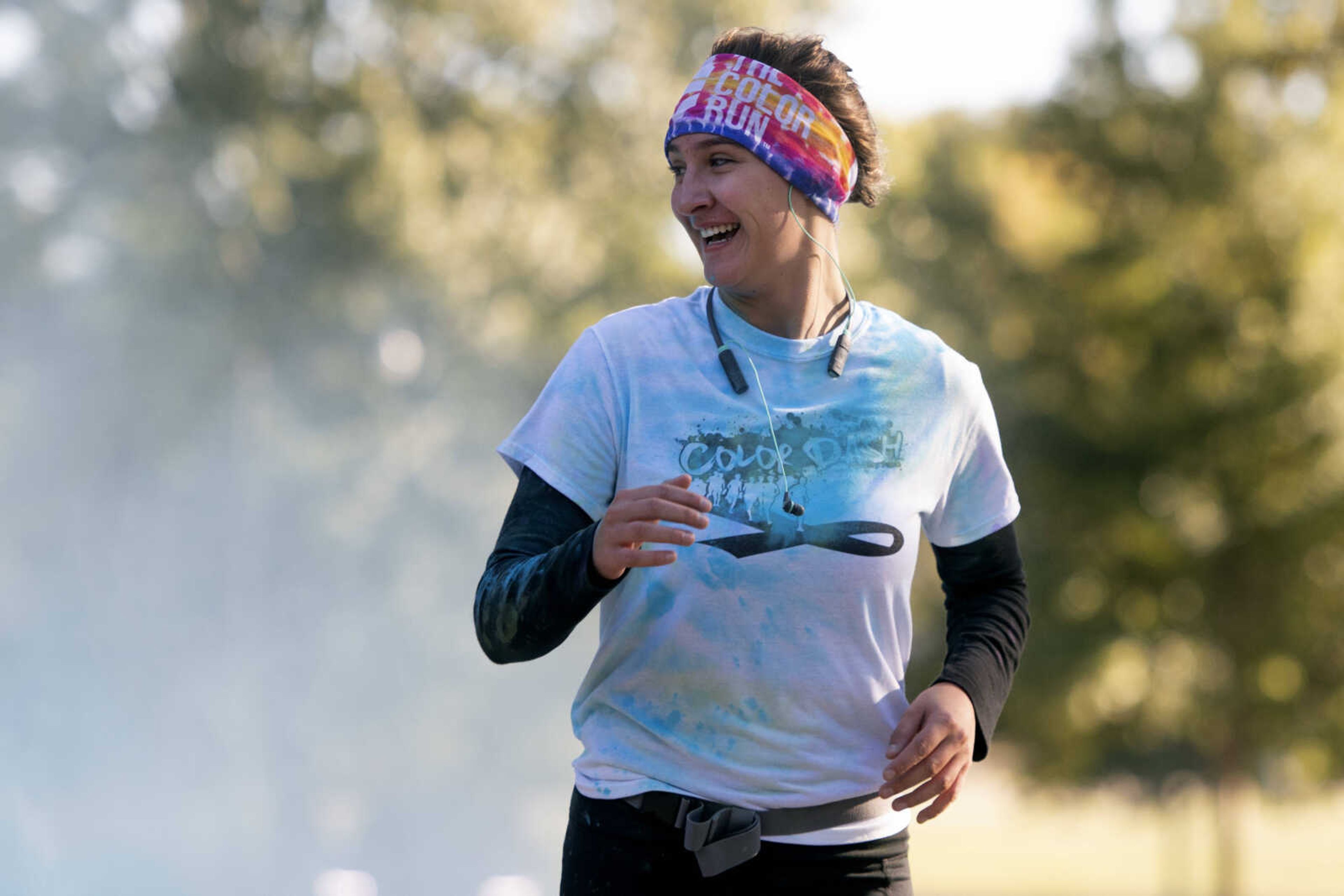 Katelin Oswald of Cape Girardeau takes part in the Saint Francis Foundation's first Color Dash on Saturday, Oct. 12, 2019, at Arena Park in Cape Girardeau.