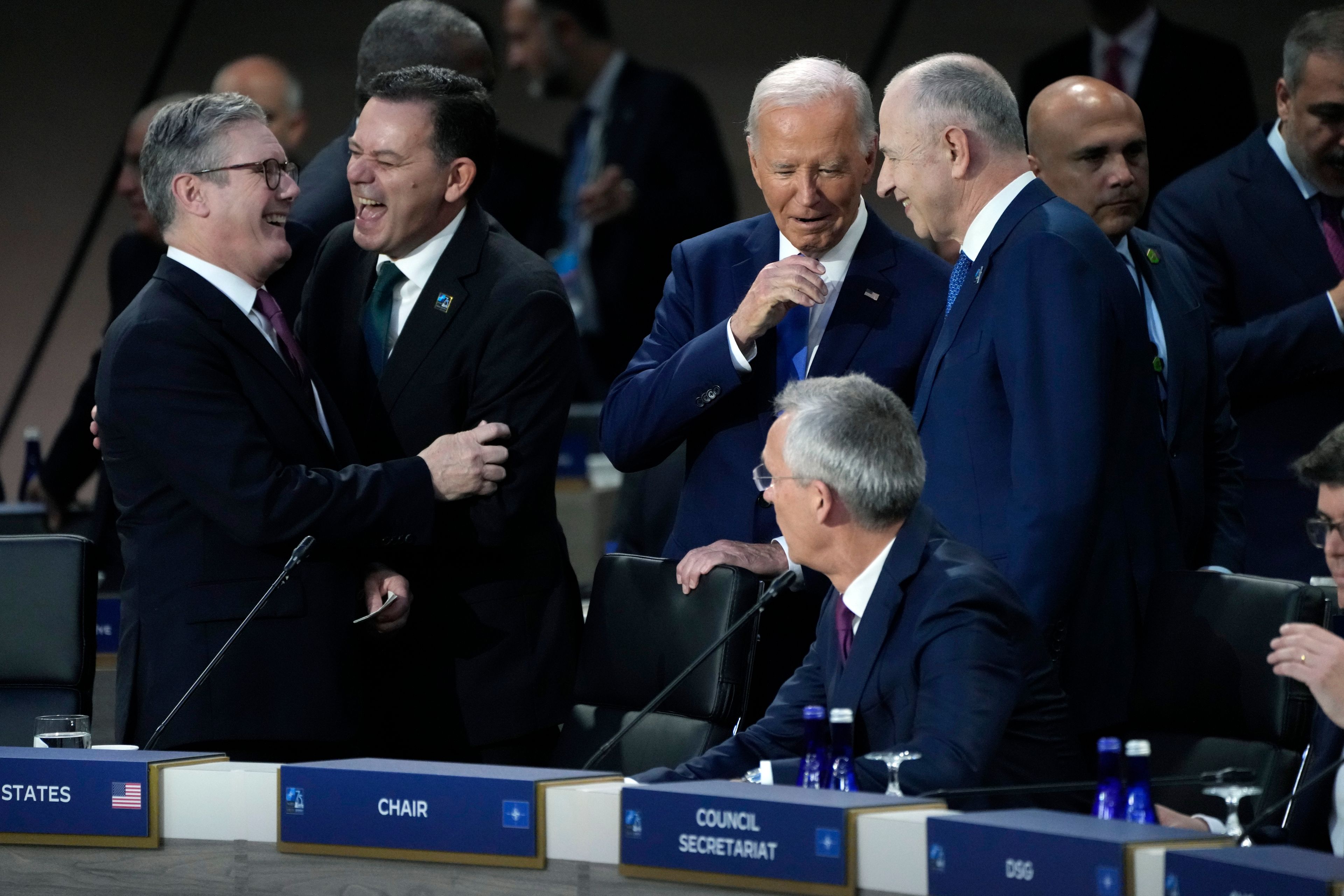 FILE - President Joe Biden arrives to attend Working Session II of the NATO Summit in Washington, Thursday, July 11, 2024. From left are British Prime Minister Keir Starmer, Portugal Prime Minister Luis Montenegro, Biden, and NATO Deputy Secretary General Mircea Geoana. Seated is Secretary General of NATO Jens Stoltenberg. (AP Photo/Jacquelyn Martin, File)