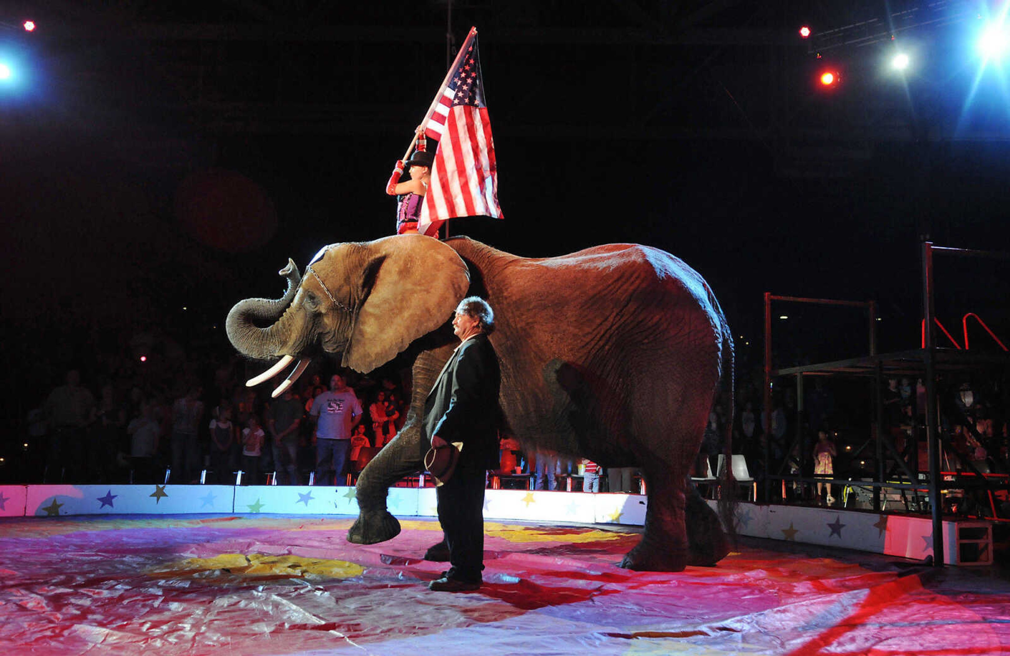 KRISTIN EBERTS ~ keberts@semissourian.com

Mariska Liebel and Hugh Blum perform with Peanut the elephant during the opening ceremony of the Piccadilly Circus at the Show Me Center in Cape Girardeau, Mo., on Thursday, April 29, 2010.