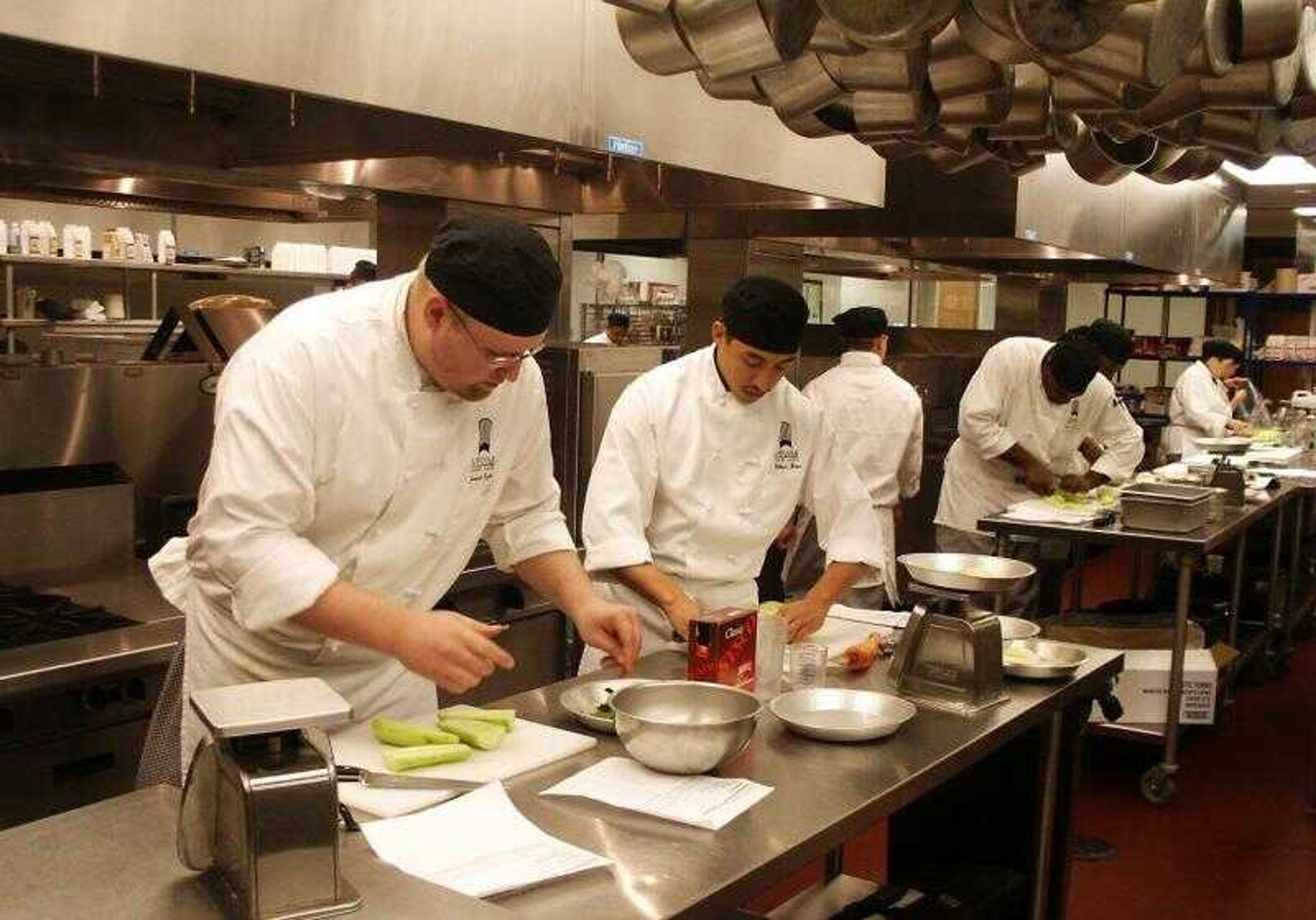 Cape Girardeau native Joseph Dufek, far left, currently attends L'Ecole Culinaire, a culinary academy in St. Louis that has seen attendance increase from 20 to 400 in its first two years. (Tom Harte ~ Provided photos)